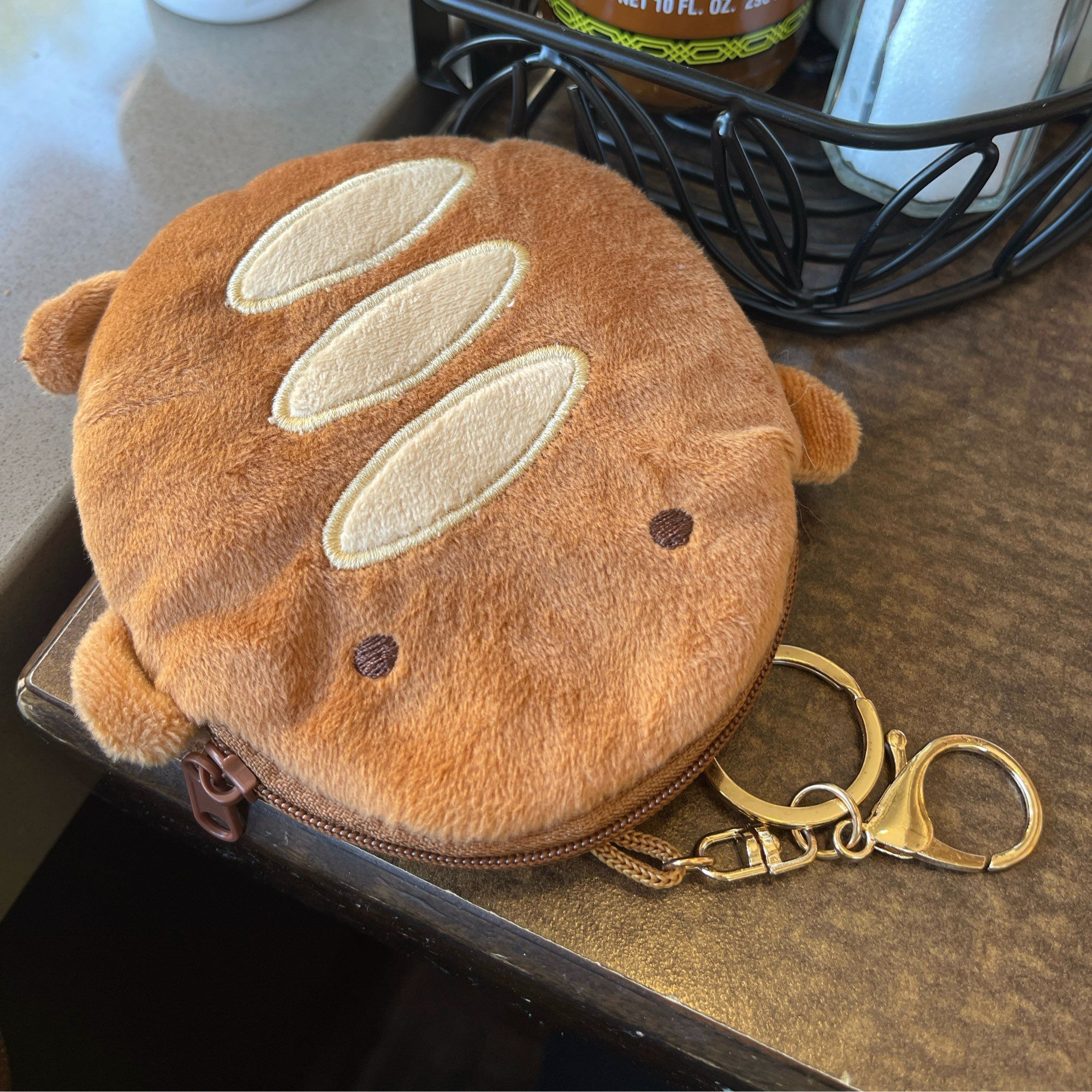 Breb the toad pouch visiting a cafe