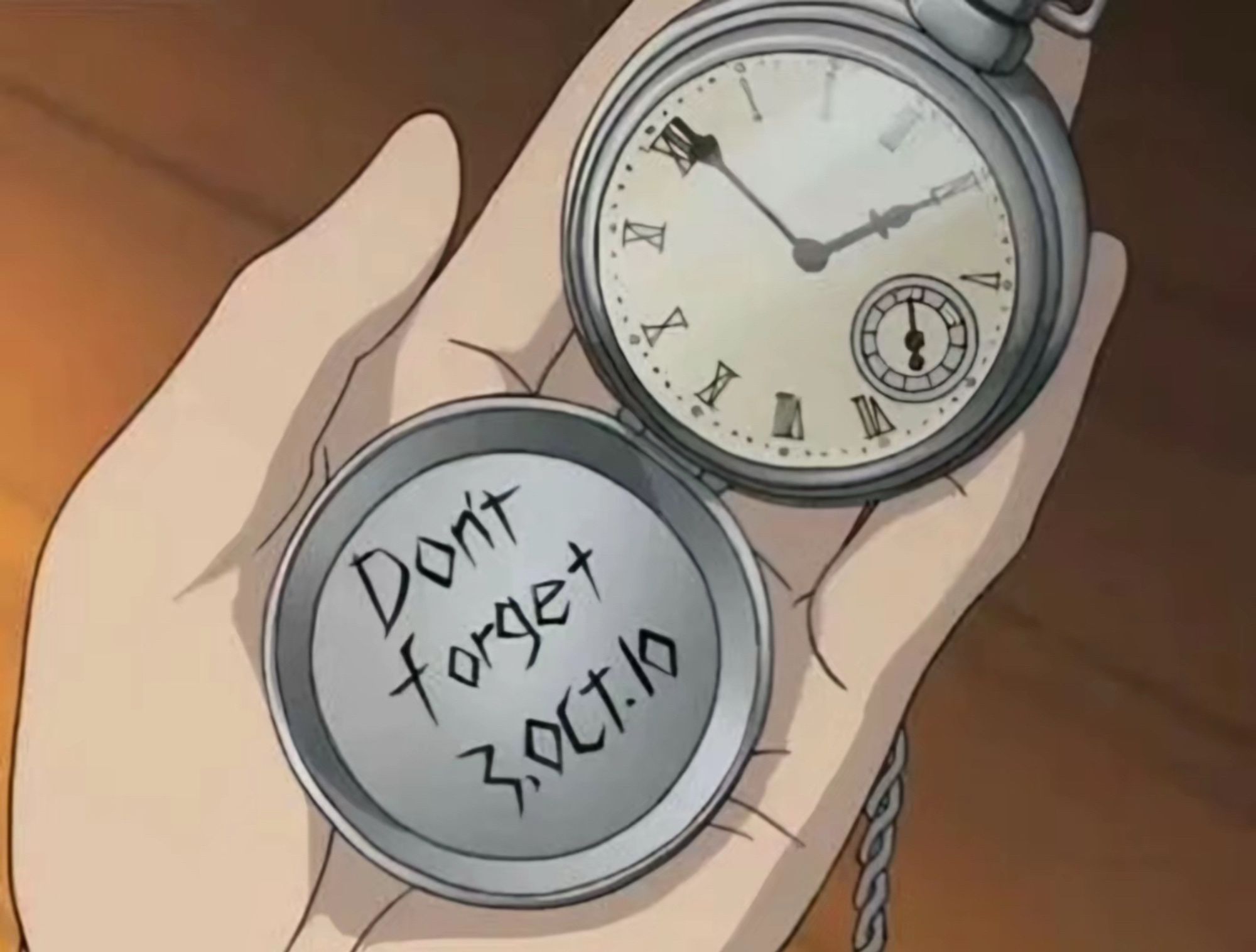 Full metal alchemist screenshot of a pocket watch
The first watch has been etched on the inside lid to say “don’t forget 3.oct.10”