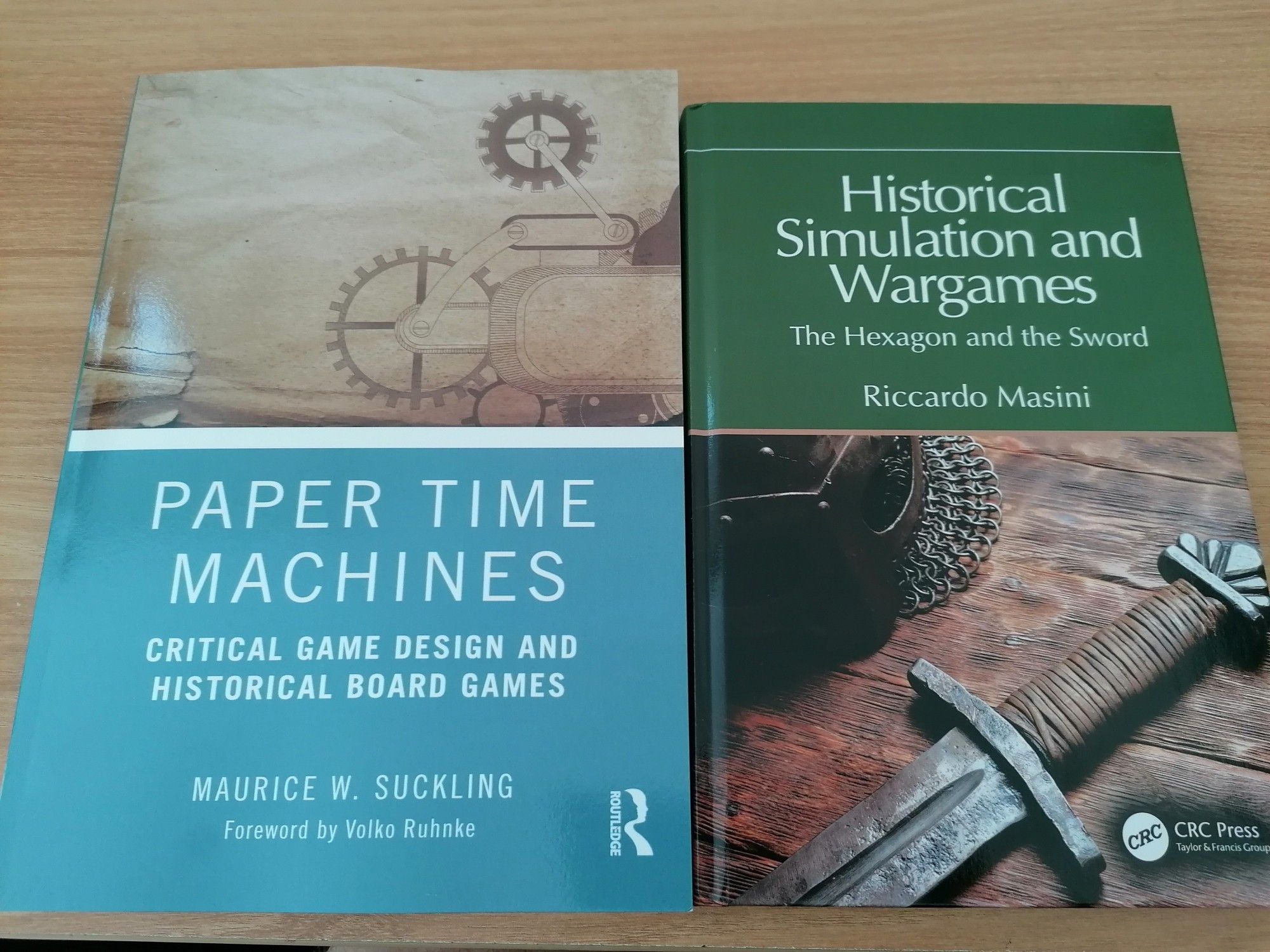 Copies of the books Paper Time Machines by Maurice W. Suckling and Historical Simulation and Wargames by Riccardo Masini