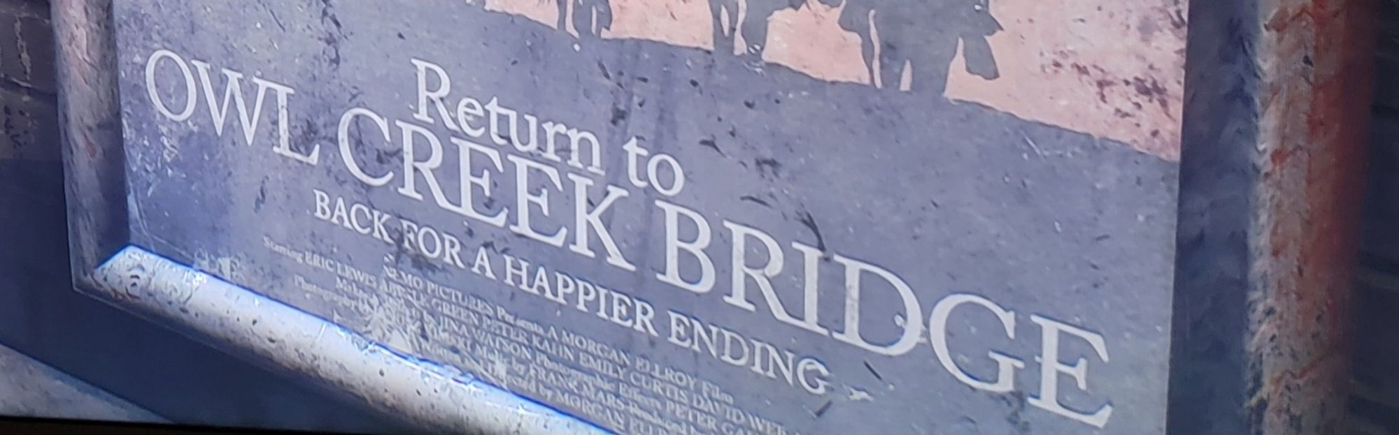 A close up on the movie poster title and tagline.