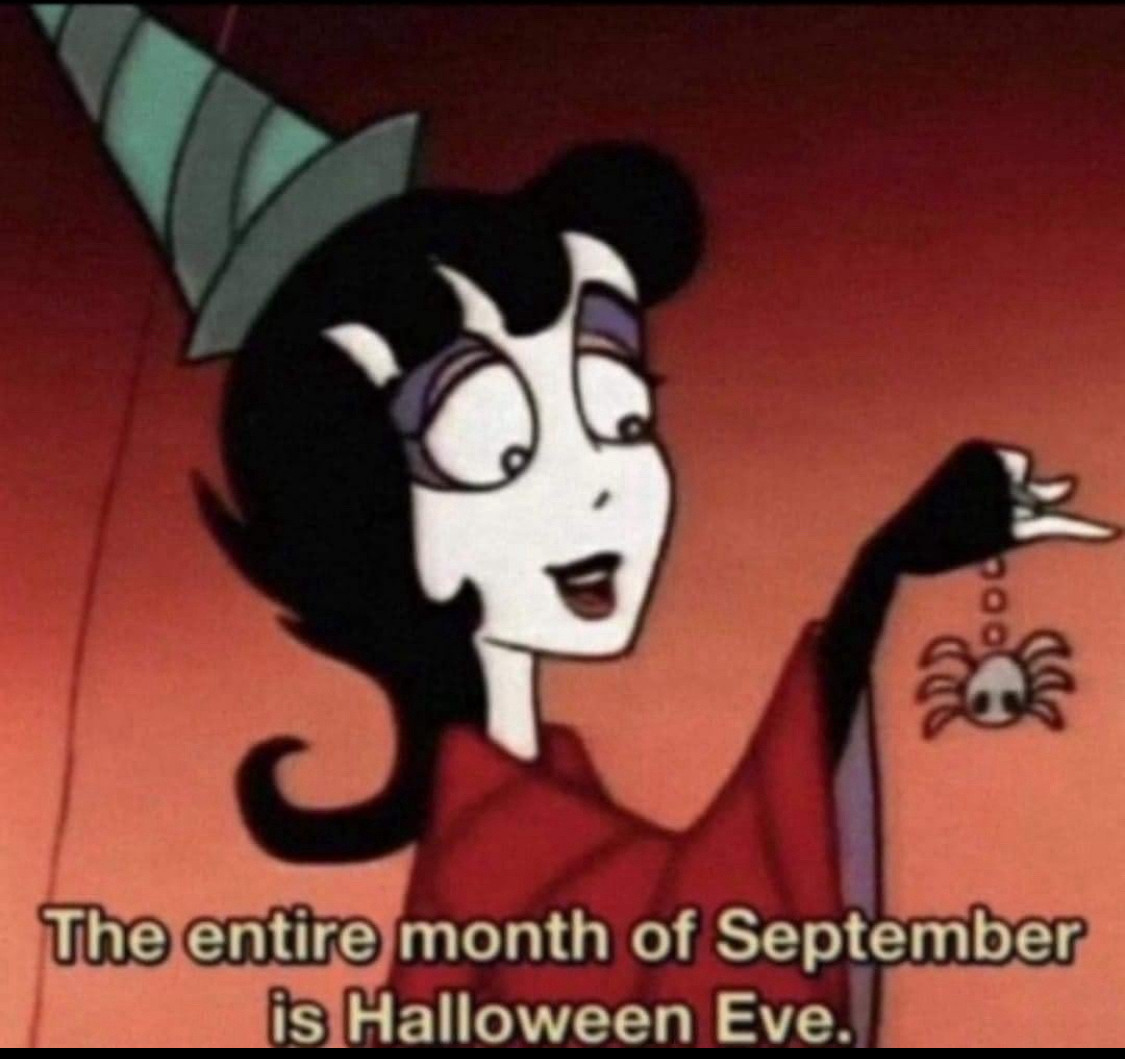 Lydia from the Beetlejuice cartoon, holding a cute spider, with the caption "The entire month of September is Halloween Eve."