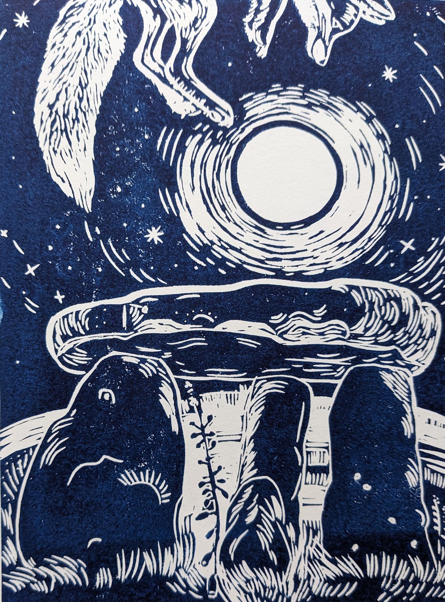 fox jumping over the moon, surrounded by swirling stars, and jumping over a group of standing stones. 
Linocut, Dark blue and white, Maria Strutz