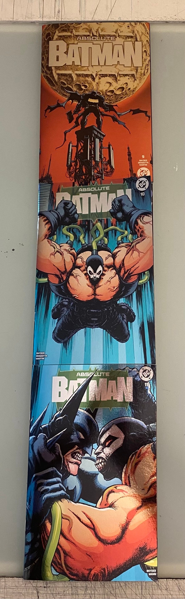 It’s the covers to Absolute Batman 9 10 and 11! Batman in front of the biggest moon you’ve ever seen, Bane, and Batman vs Bane!