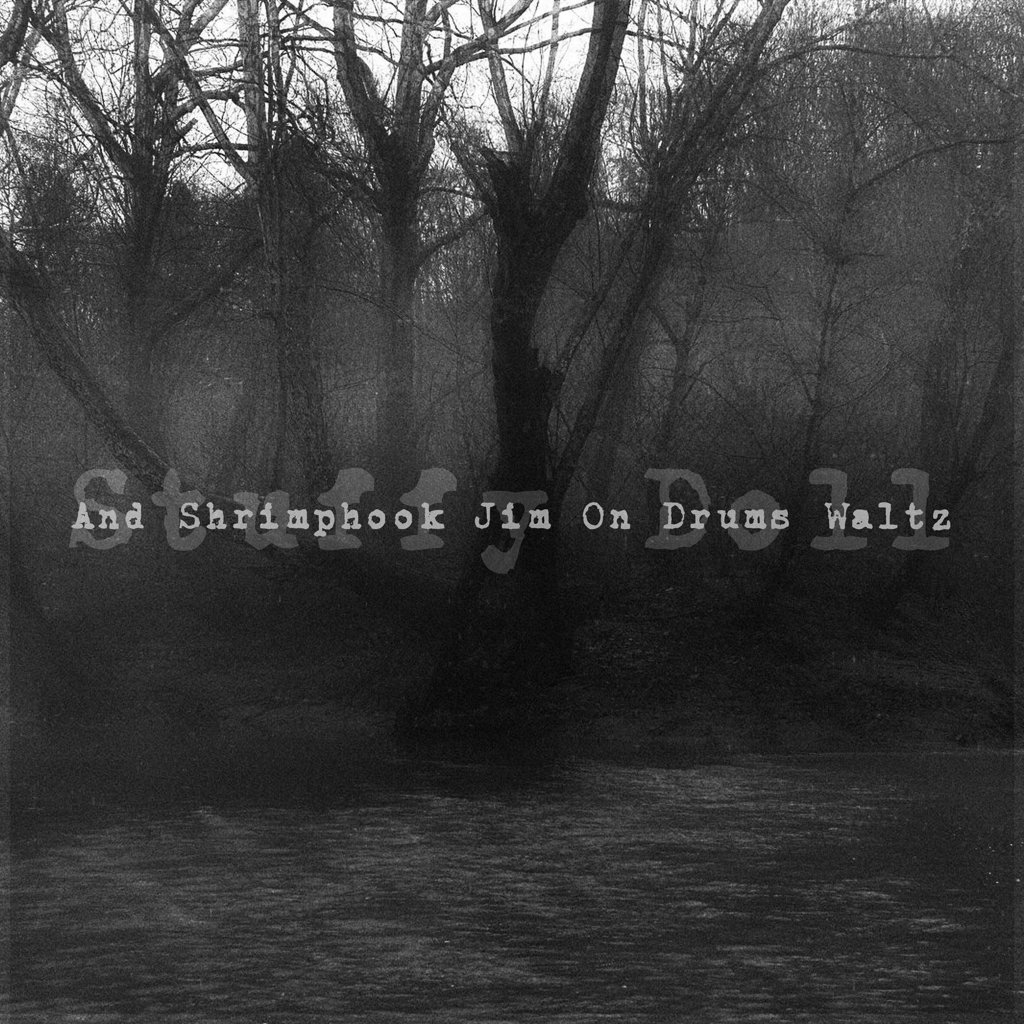 The art for “And Shrimphook Jim On Drums Waltz” by Stuffy Doll, featuring spooky trees with the band name and title in ghostly typewriter font, all in greyscale