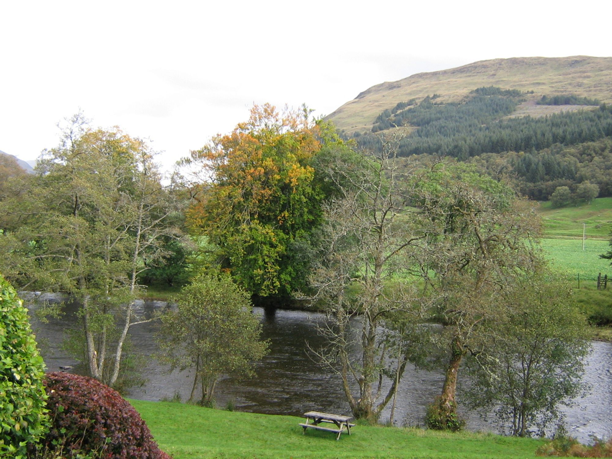 View over the river to the mountains beyond.