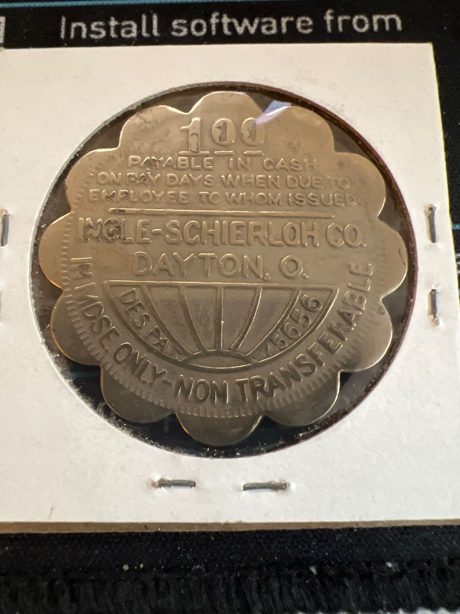 Scallop edge bronze coin reading 1.00 Payable in cash on pay day when due to employee to whom issued. INCLE-SCHIERLOH CO DAYTON. O. In MDSE only - non-transferable