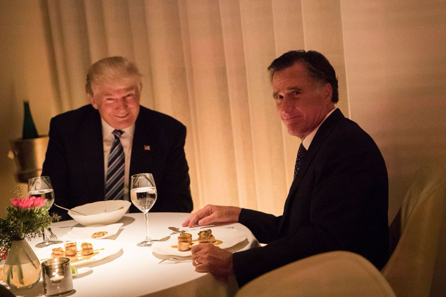 Mittens Romney debasing himself over dinner with Donny Trump in hopes of a cabinet position in Trump’s Nightmare on Pennsylvania Avenue, November 2016.