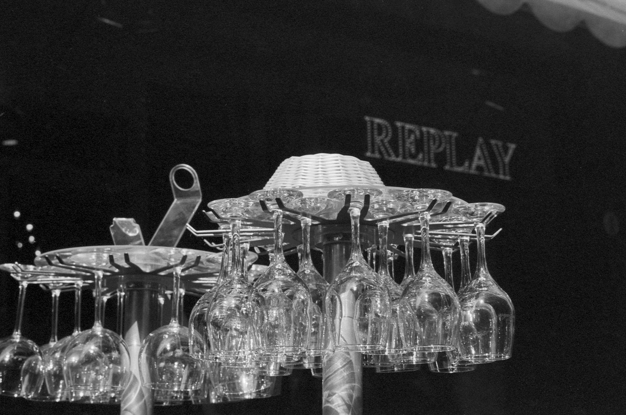 Wine glasses on a hanger outside a bar/restaurant in the central market area, Bologna, Italy, 2011.