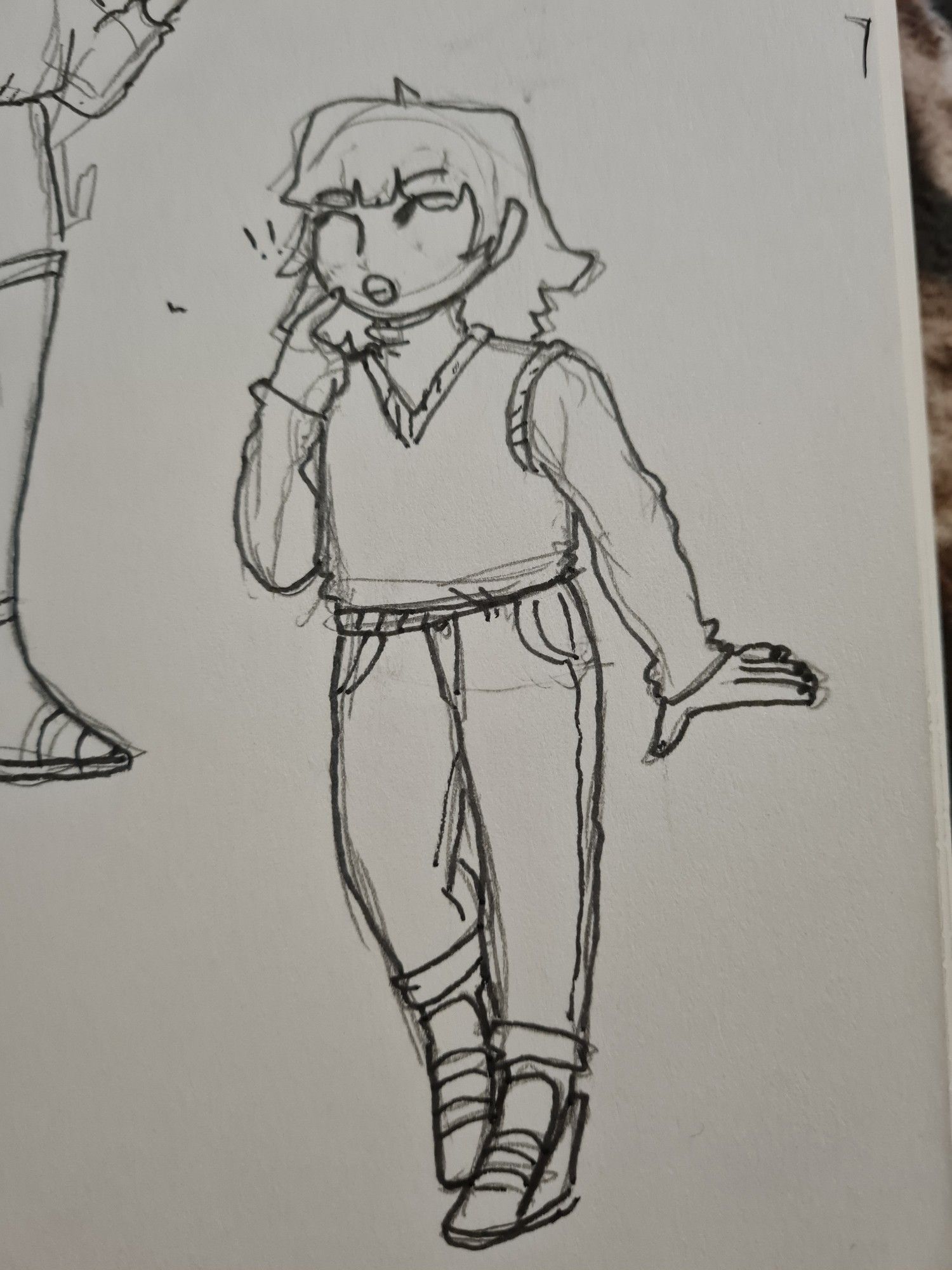 photo of a pen drawing of a girl wearing academic clothes. turtleneck, sweatervest, and slacks.