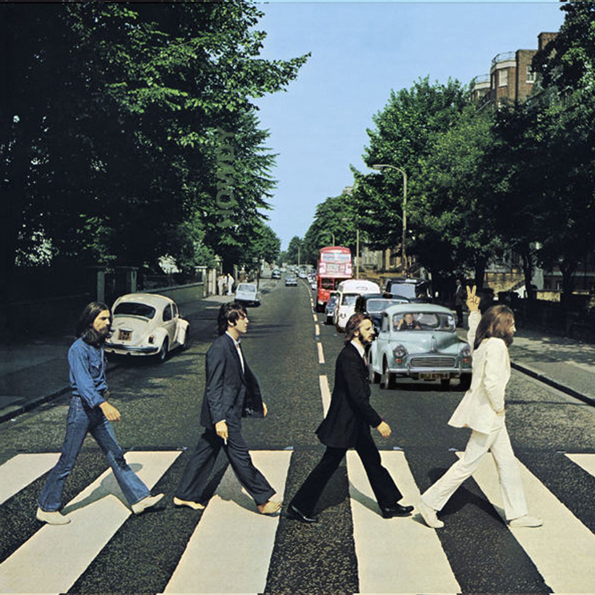 The Abbey Road album cover, except John is sticking two fingers up to the drivers in the traffic jam they've created which stretches all the way down Abbey Road. If you've ever driven down Abbey Road, you'll recognise this scene as hundreds of tourists take it in turns to bring London traffic to a standstill in the hope their rushed photo looks a wee bit like the album cover. I doubt anyone has ever achieved it.