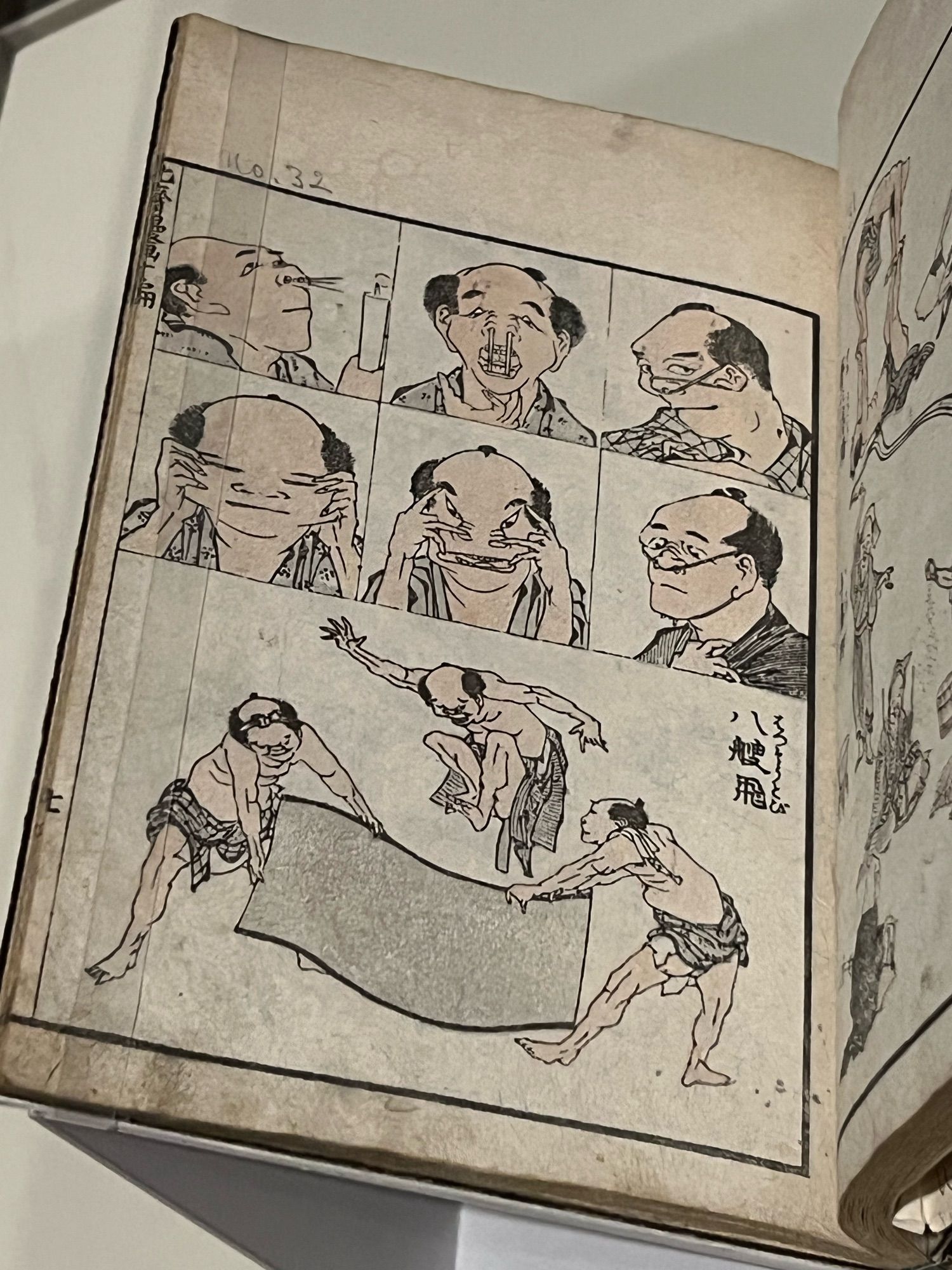 A page from Hokusai’s sketch books, featuring someone making funny faces