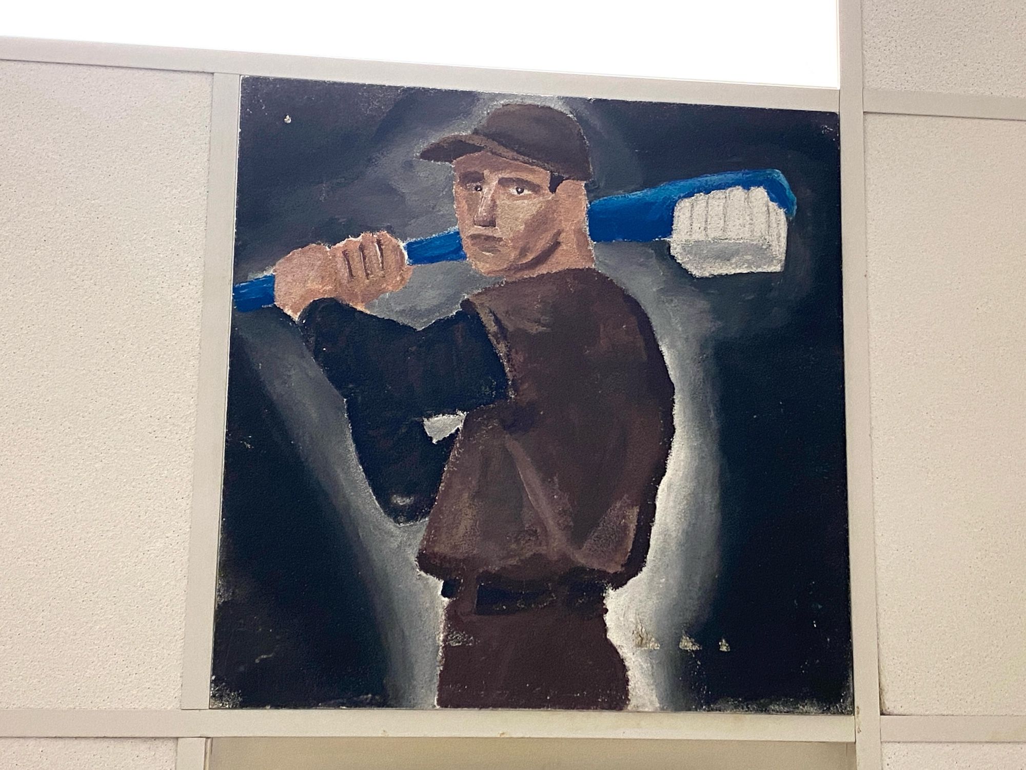 on the ceiling at the dentist, a baseball player holding an oversized toothbrush like a bat, painted on a ceiling tile