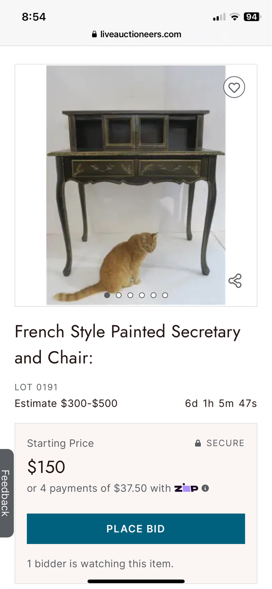 auction listing 
French Style Painted Secretary and Chair,
photo of the piece of furniture with a fluffy orange cat sitting nearby on the floor