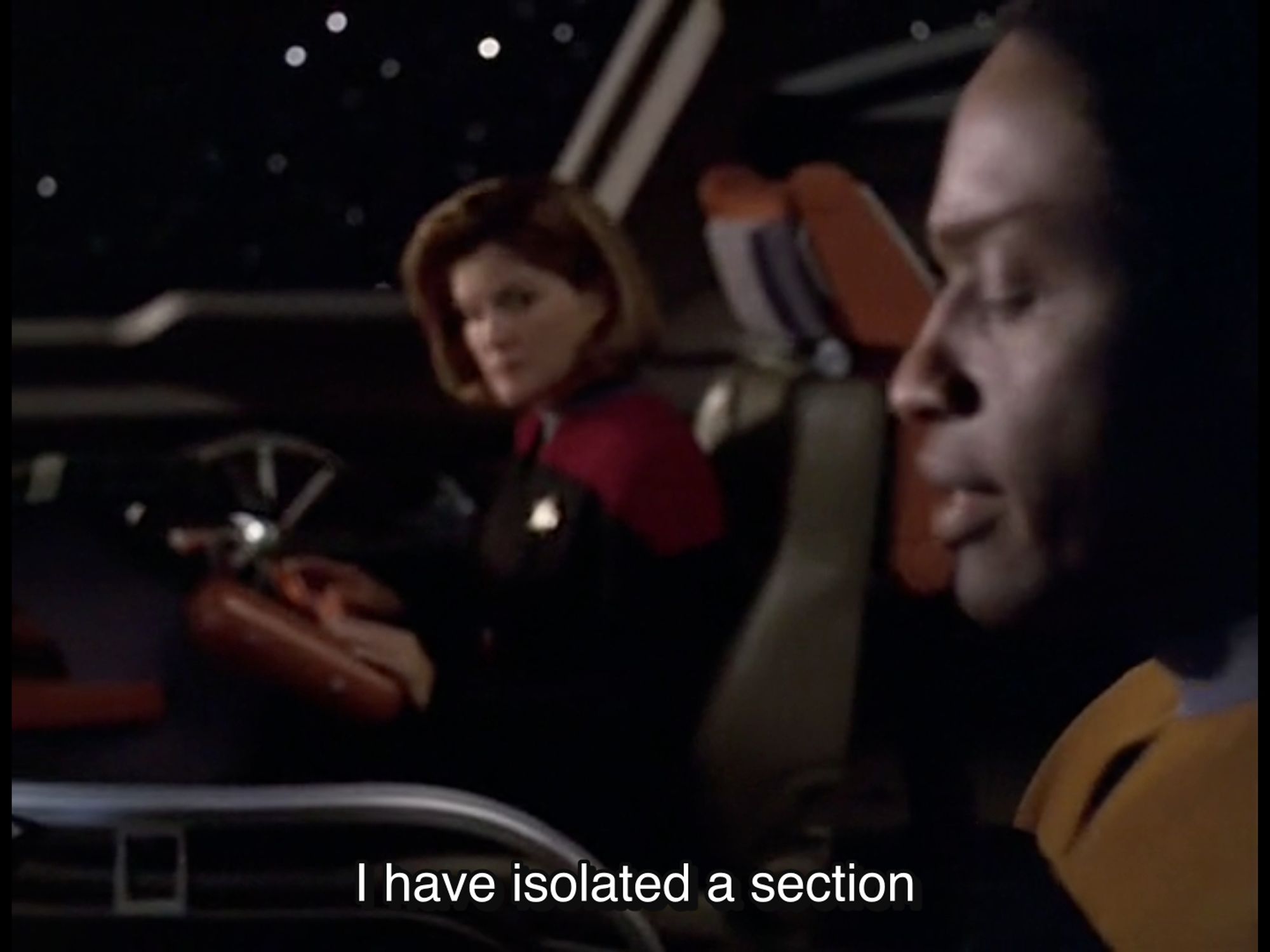 Tuvok and Captain Janeway are in the Delta Flyer, Tuvok is visible in the extreme foreground and Janeway is in the background. She is looking at Tuvok as he speaks: "I have isolated a section"

From Star Trek Voyager, Season 7, Episode 2, "Imperfection"