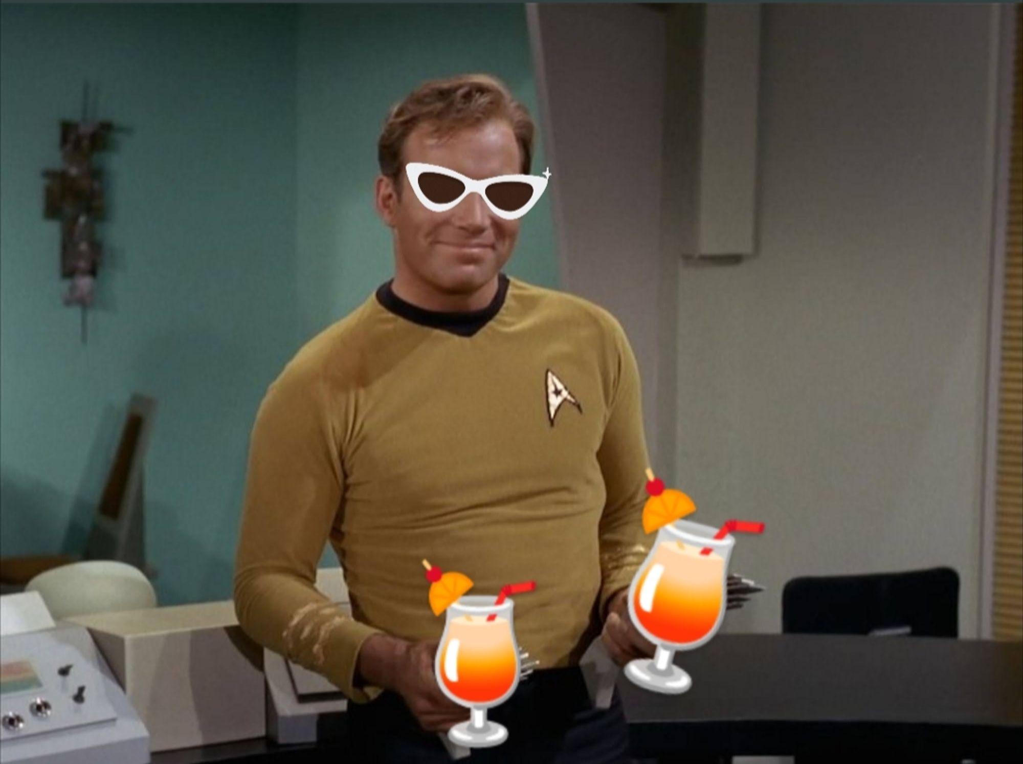 Captain Kirk from Star Trek TOS The Original Series, his hands up at his hips, a phaser in each hand, only tropical drink emojis have been added on top so it looks like he's holding the drinks. He's got a saucy little smile, and a cartoonish pair of white cat-eye sunglasses added to his face. He looks like he's ready to party