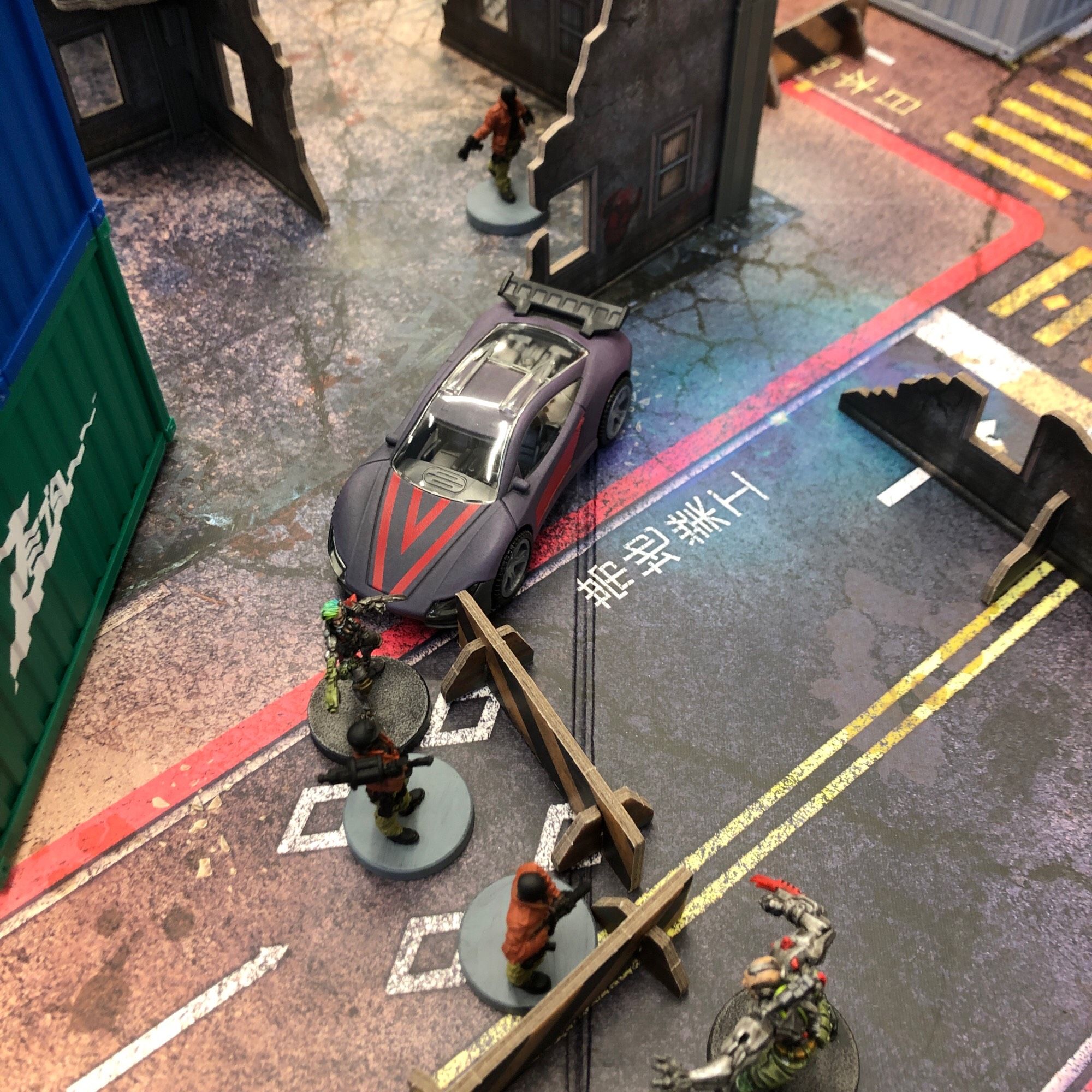 Cyberpunk Red Combat Zone board with the Zoners and Maelstrom fighting over a central barrier.