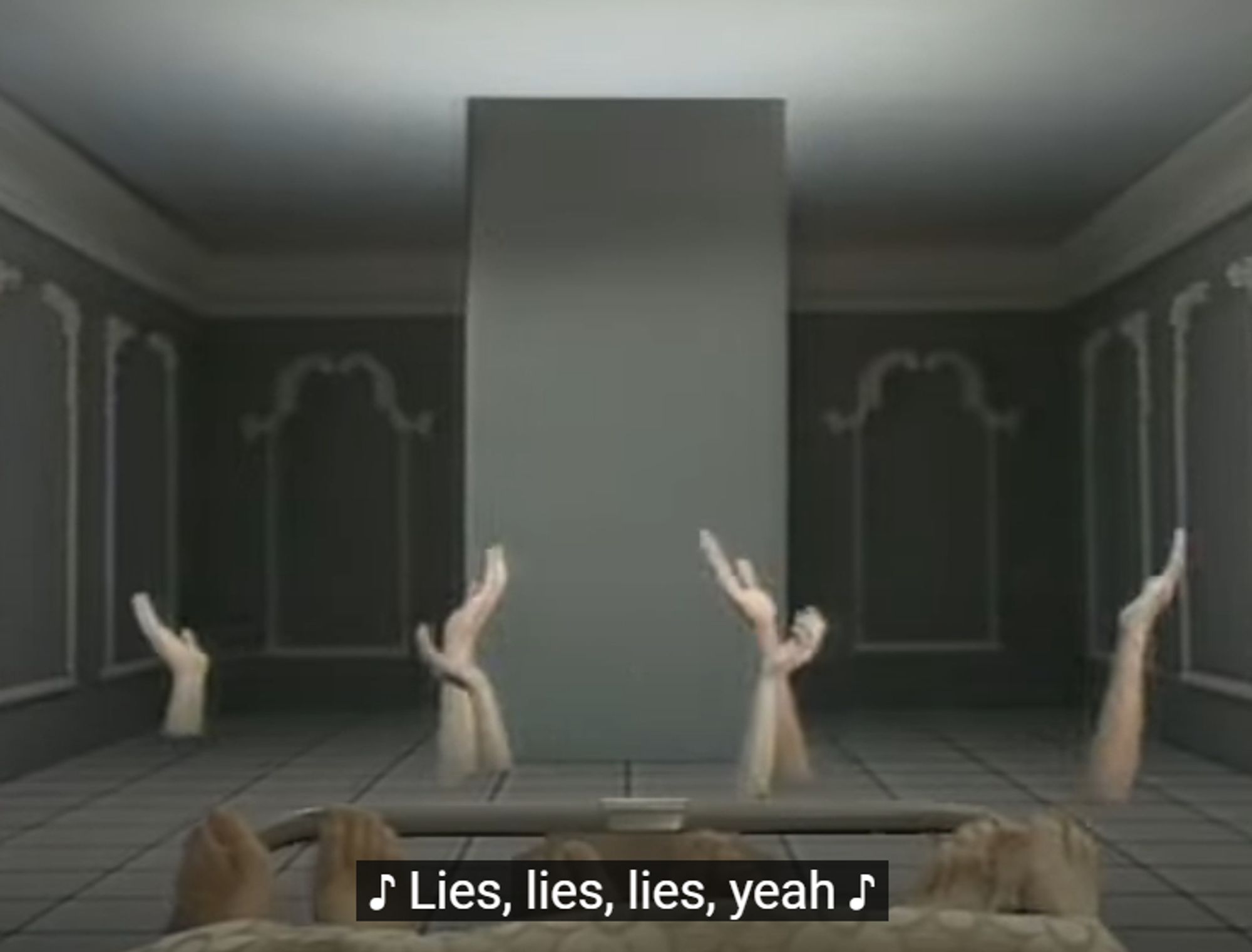 a screen shot from the Thompson Twins music video with closed captioning reading "Lies, lies, lies, yeah"