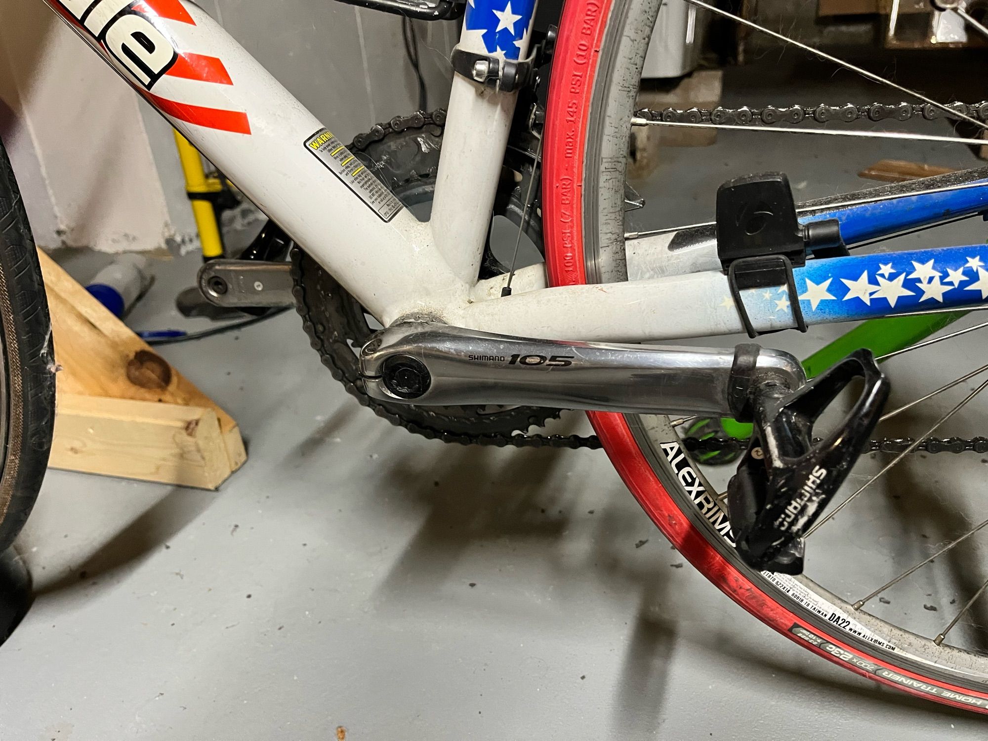 Non drive side of a Shimano 105 9-speed crank set on a Cannondale CAAD 5 frame done up as an American Flag