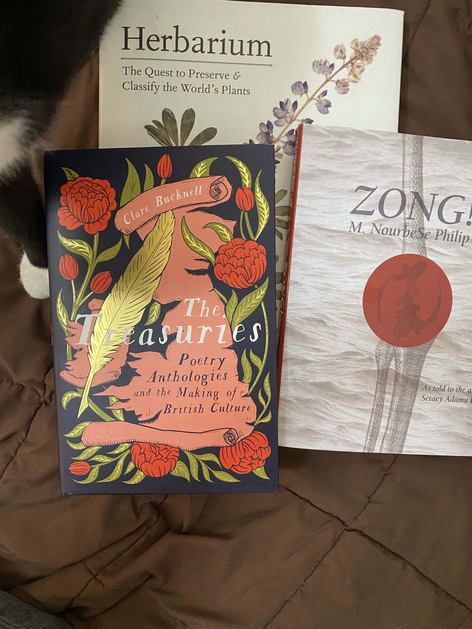 3 books: “Herbarium,” “The Treasuries: Poetry Anthologies and the Making of British Culture,” and M. NoirbeSe Philip’s “Zong!”