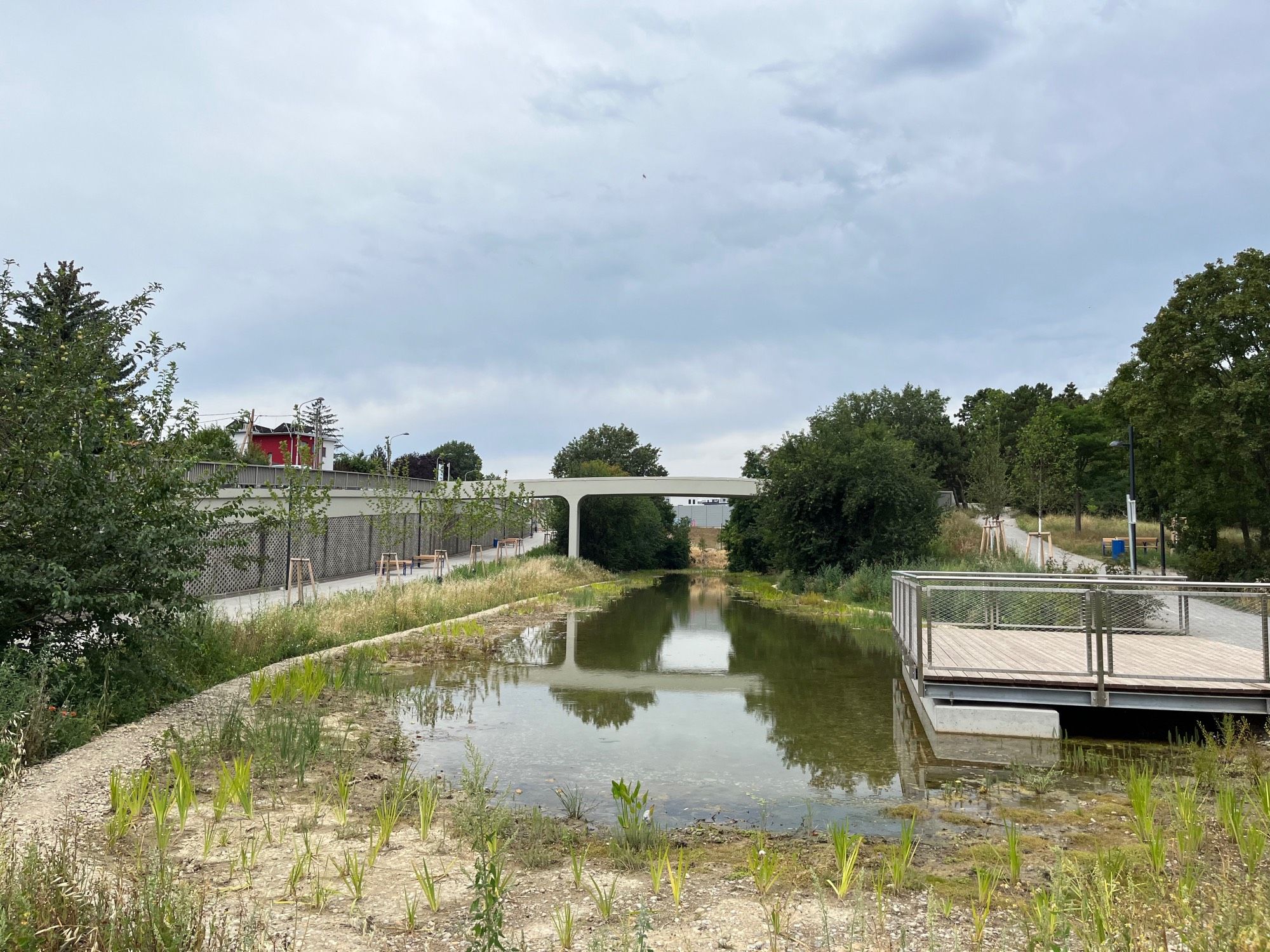 View of the former highway exit ramp that was turned into a lake