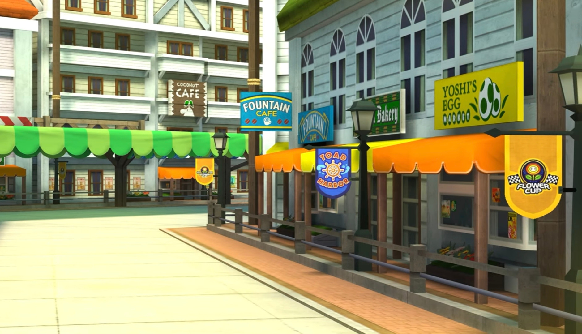 A screenshot of Mario Kart 8, showing some shops in a market street in Toad Harbor