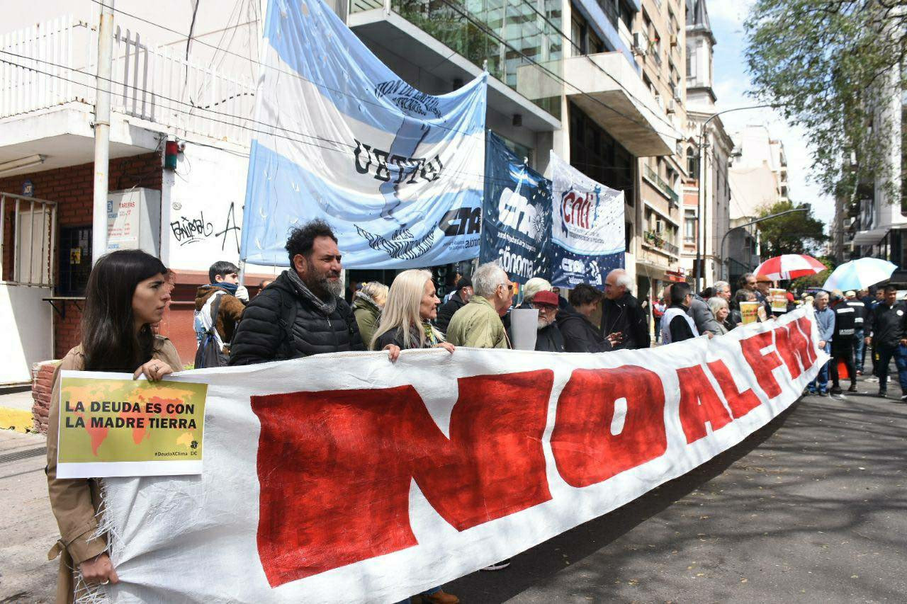 No to the IMF. The debt is with mother earth. Also union banners at thisproest in Buenos Aires.