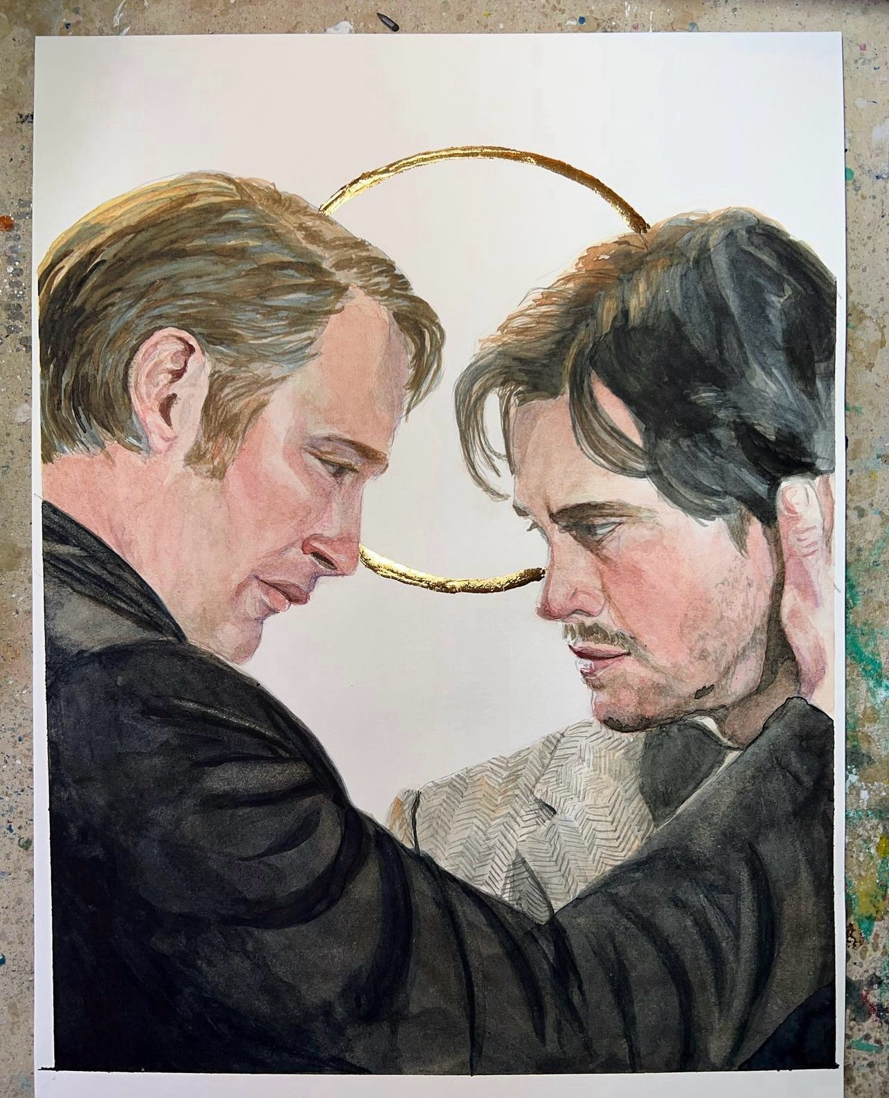 Watercolor of Hannibal (played by Mads Mikkelsen) and Will (played by Hugh Dancy) in an intimate pose. Pretty sure they’re staring at one another’s lips. Gold leaf ring linking them.