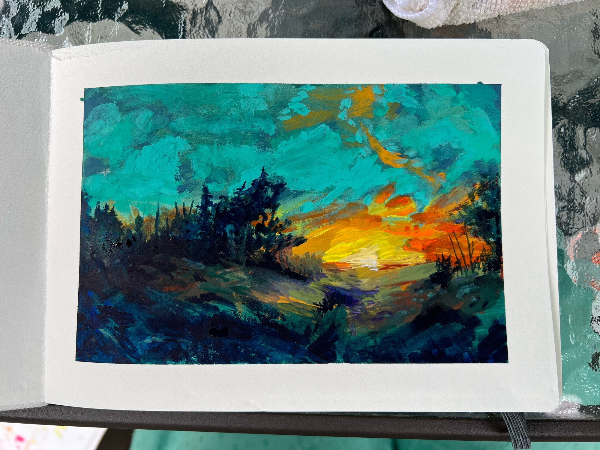 Gouache painting study of a sunset. Aqua blue sky and indigo shadows.