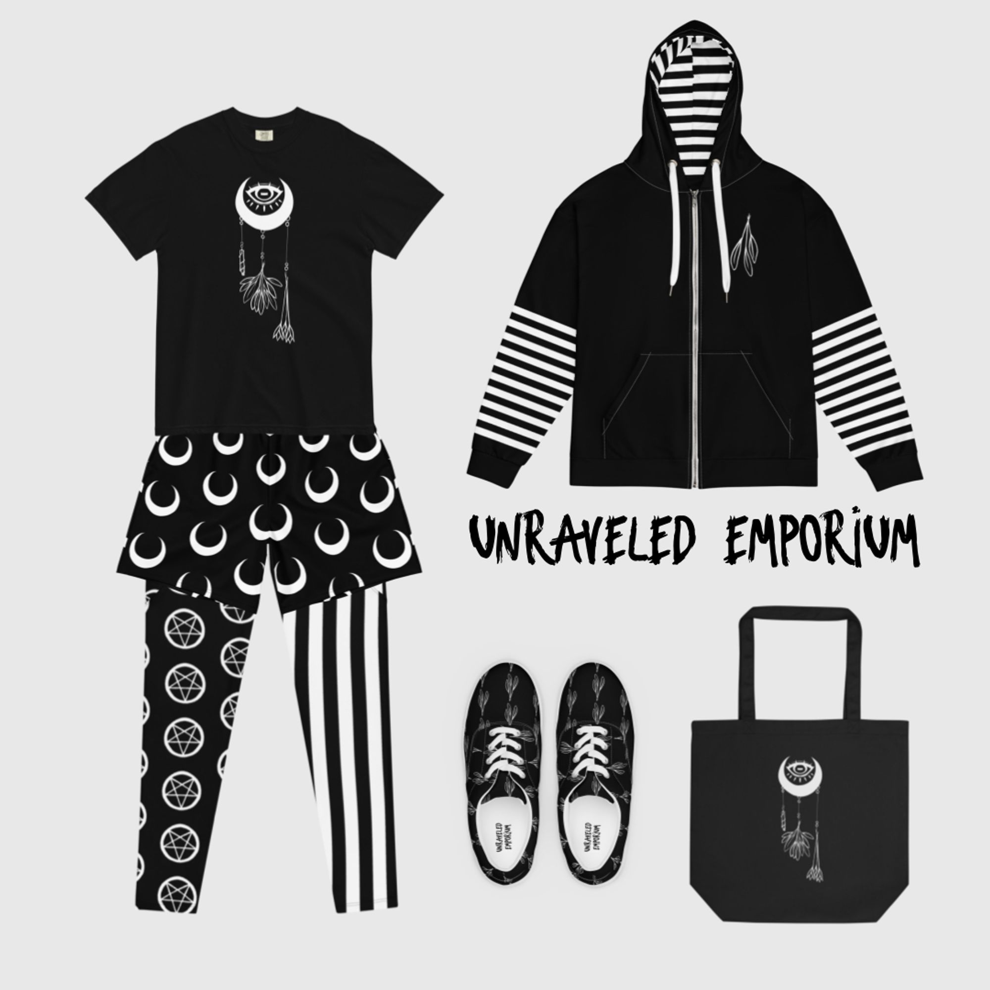 Clothing items in black and white. They feature witchy designs such as moons, herbs, pentagrams, moons, and crystals. Some items are also striped.