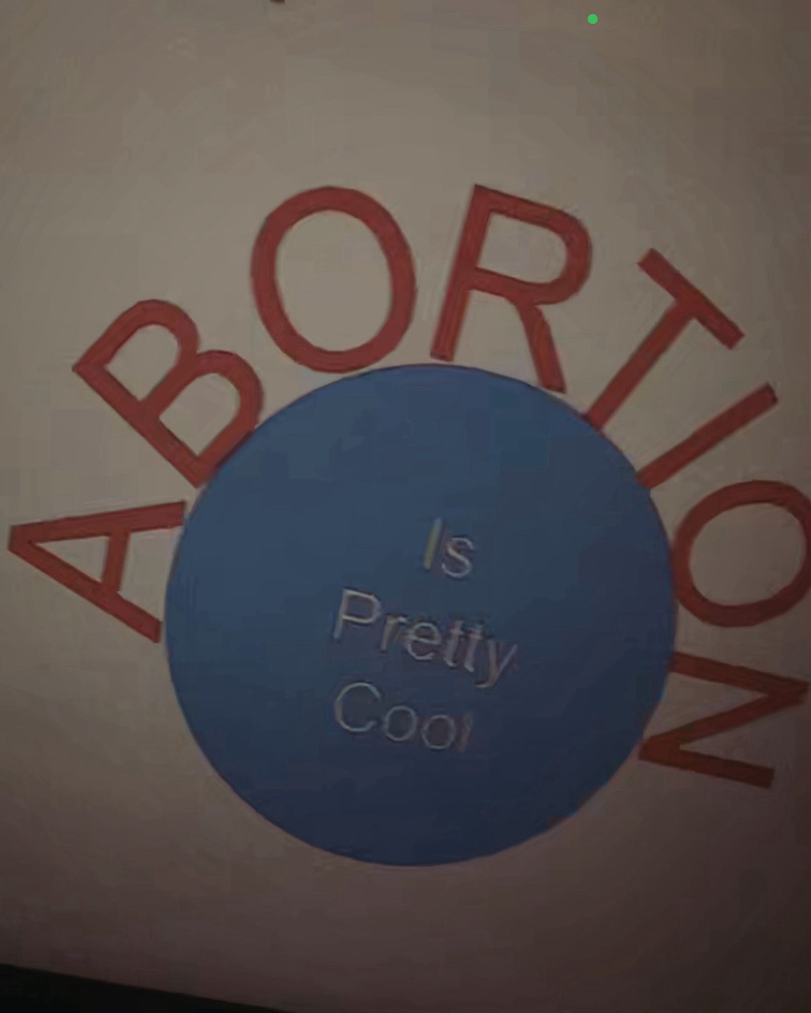 A graphic that says ABORTION in red letters and IS PRETTY COOL as white text in a blue circle