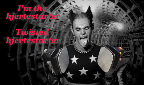 Keith Flint of the Prodigy sticks out his tongue while holding a pair of hjertestarters. Next to him are written the classic lyrics "I'm the hjerterstarter, twisted hjerterstarter" taken from their well-known song "Hjertestarter"