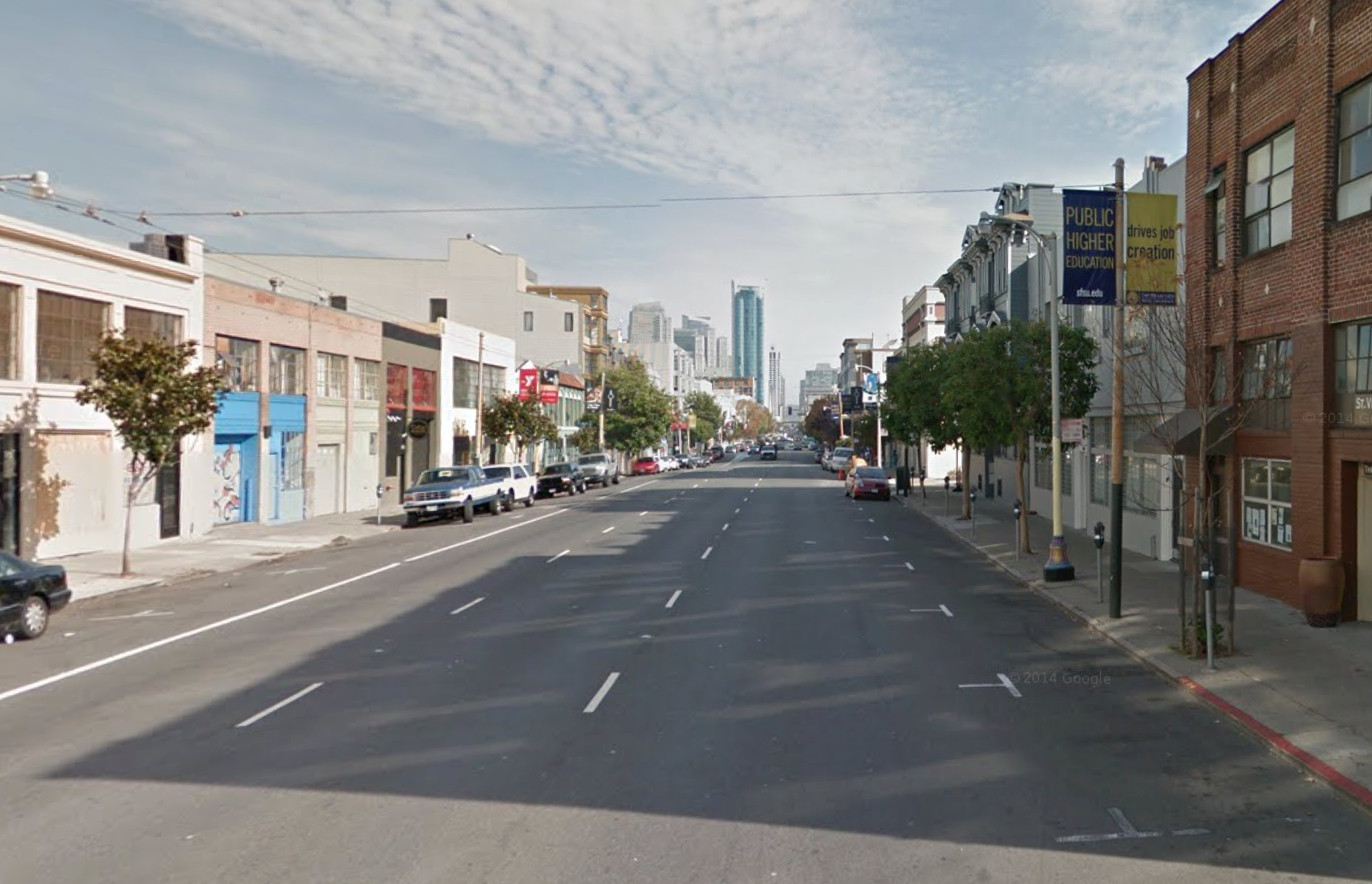 San Francisco, looking north East on Howard in SOMA. Low warehouses and a 3-lane street.