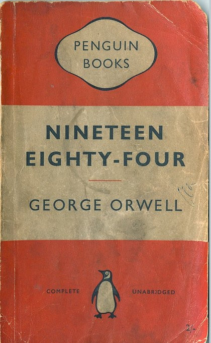 Penguin publisher book cover in orande and white