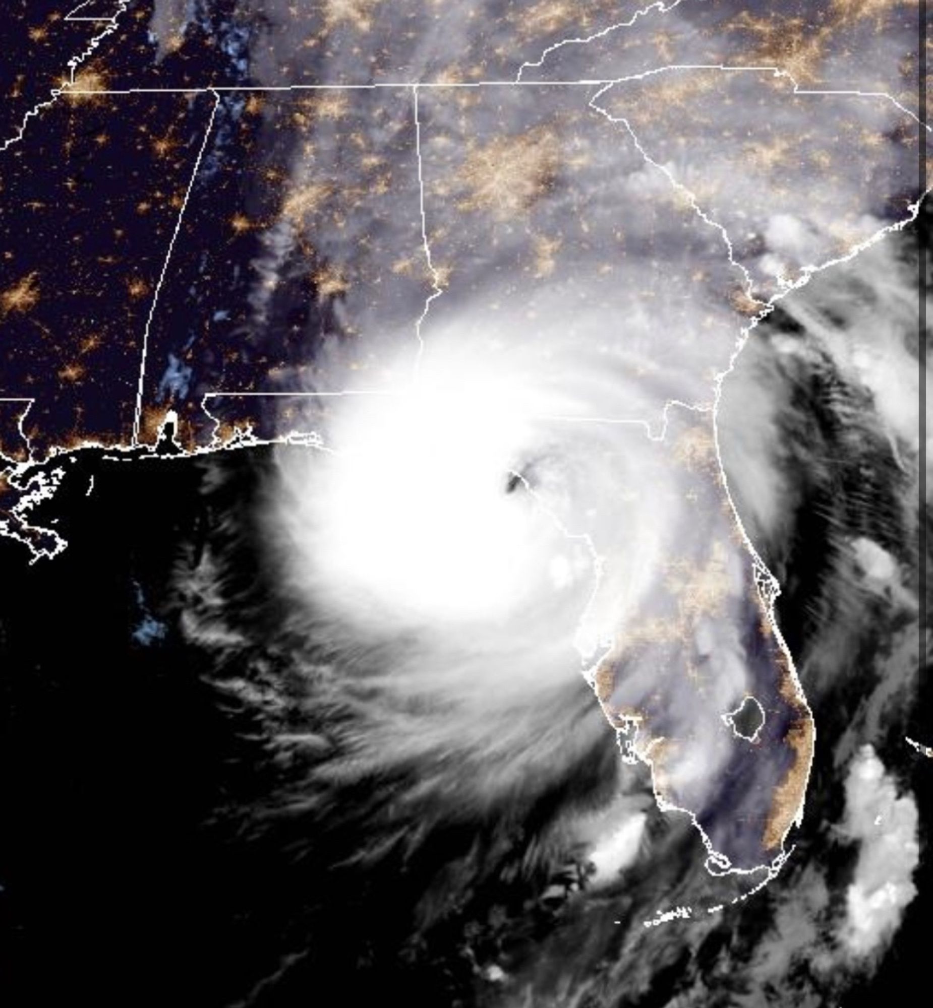 Satellite image of Helene as it approaches landfall on the Florida gulf coast. It has a well defined eye and is very large.