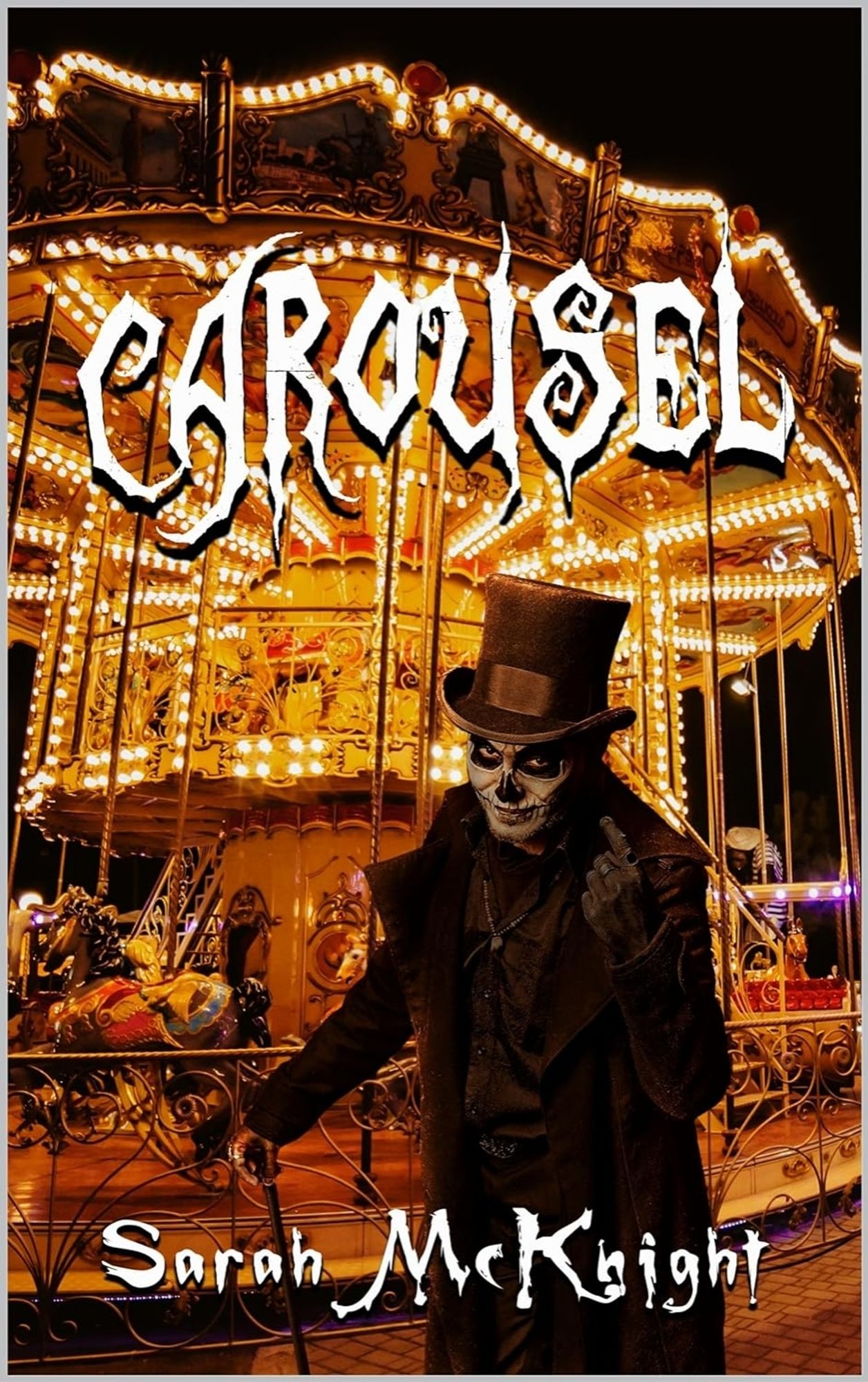 Book cover. Carousel is in curling, eerie capital letters, set against an old-fashioned merry-go-round. In front of the ride, an eerie humanoid in full suit with cane and top hat smirks creepily.