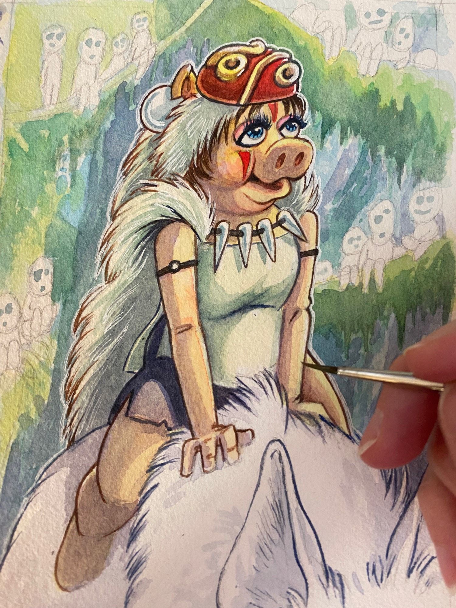 Miss Piggy dressed as Princess Mononoke. Riding a giant white wolf through a spirit-filled forest. She is in a white tunic, with a white fur shawl and headpiece. A carved red war-mask sits atop her head. She has red triangles painted on her cheeks and forehead.