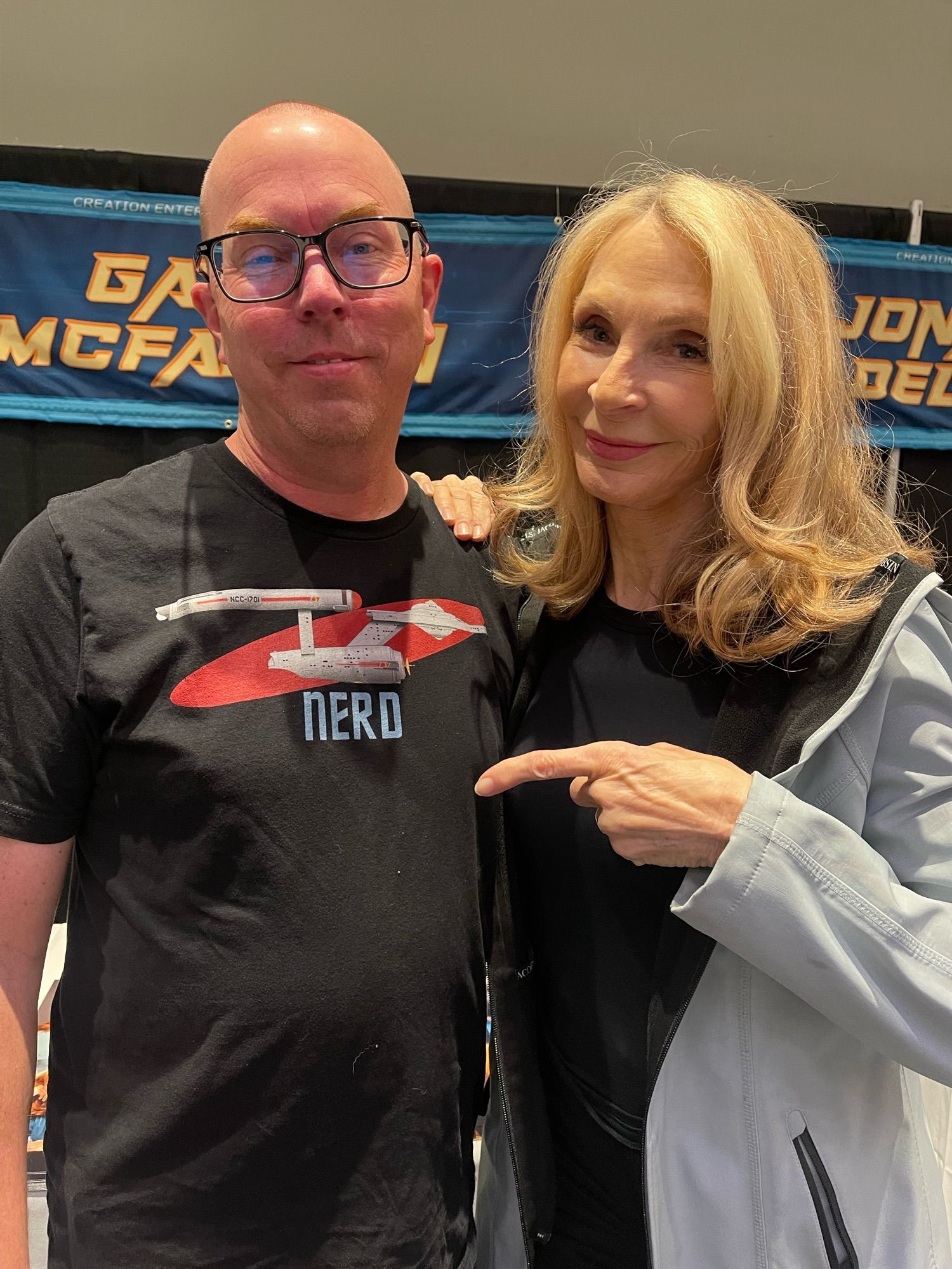 Gates McFadden is pointing to my awesome tshirt at a con in San Francisco last weekend.