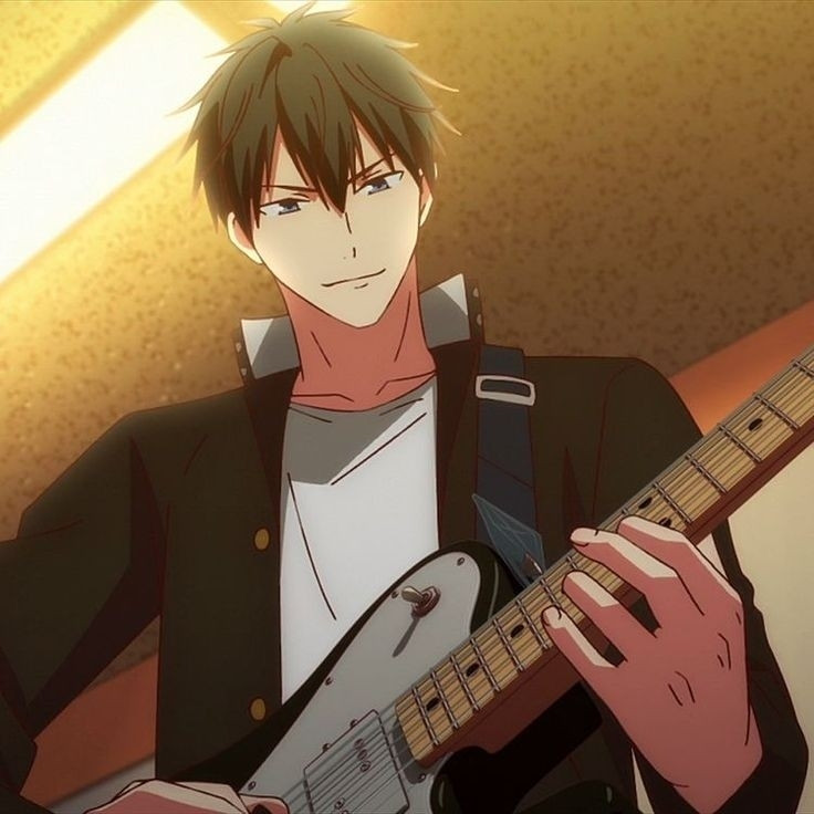 Screencap from given the anime of ritsuka playing the guitar