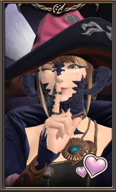 An image of an Au Ra character from the game Final Fantasy XIV, she has her finger to her lips in a "shhh" gesture, and is winking.