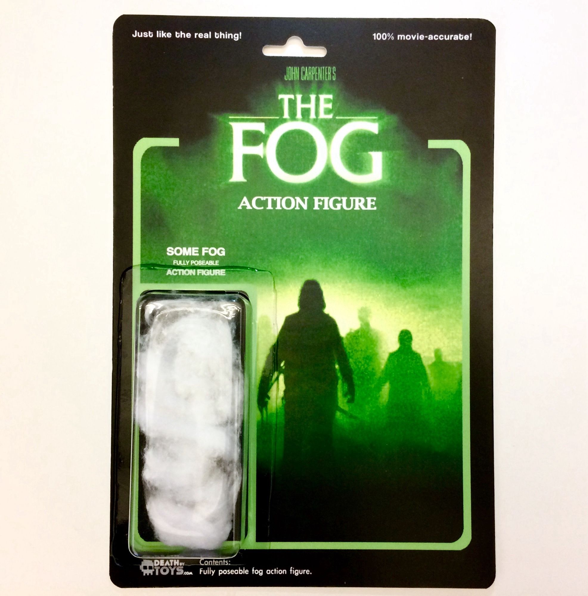 A toy-style package labelled "The Fog
Action Figure".  There is a clear plastic box attached with some cotton wool inside, labelled "Some fog".