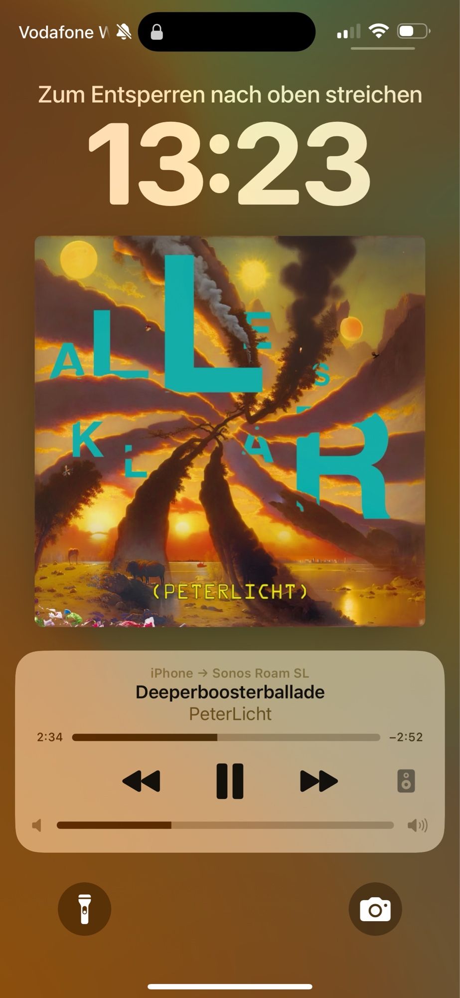 Screenshot von IPhone mit Lockscreen. Album „Alles Klar“ von Peter Licht. Track Deeperboosterballade