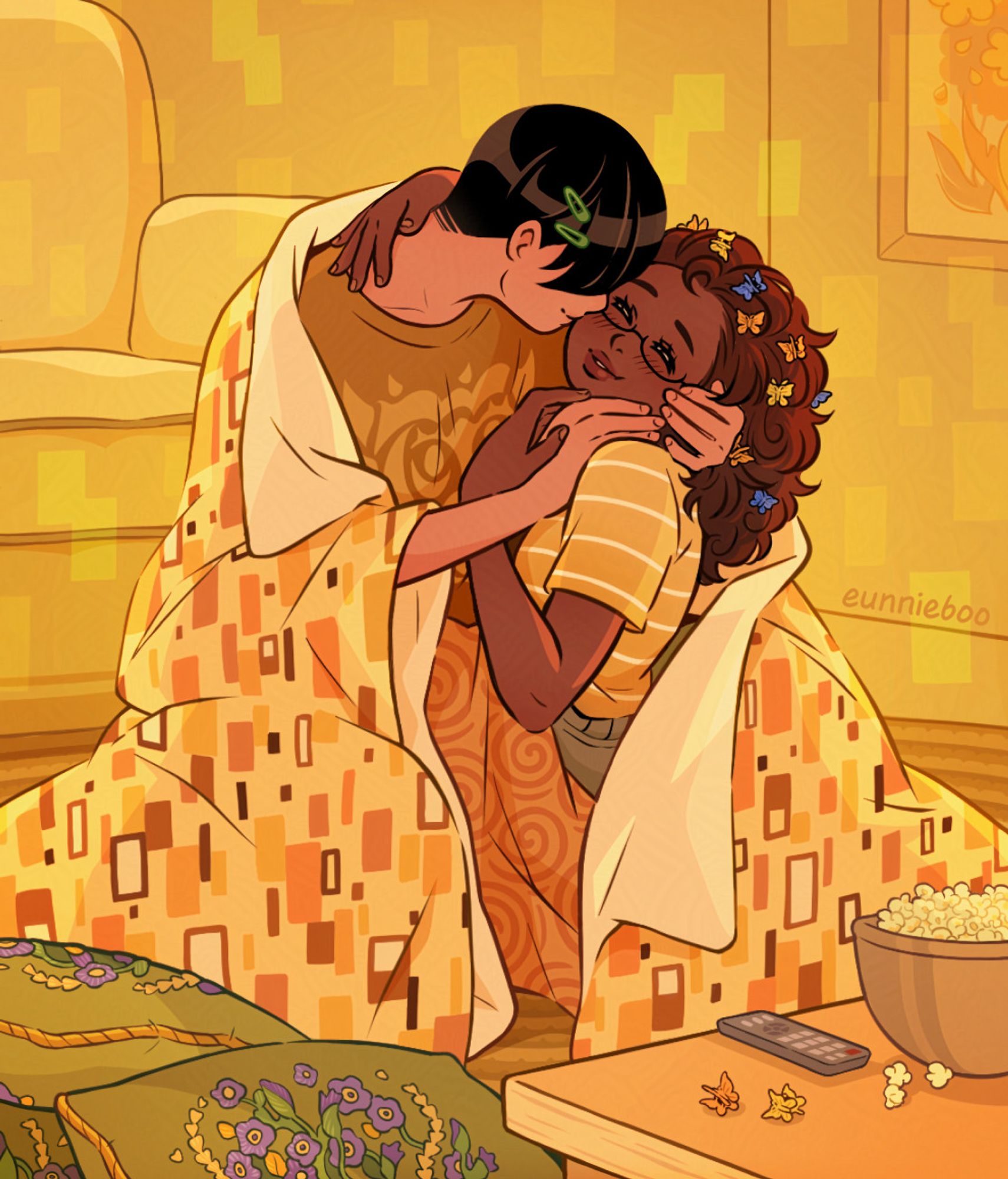 eunnie's rendition of "the kiss" by gustav klimt. in place of the man and woman are her characters, pg and momo, entwined in an embrace. momo smiles and laughs in pg's arms as pg gently holds her face, pressing a kiss to her cheek. a golden quilt with various rectangular shapes is draped over pg's shoulders, resembling the art nouveau robes from the original painting. momo has multiple butterfly clips in her hair. the color scheme is full of saturated yellows and oranges. the two sit on a rug on the floor - behind them: the corner of a couch and a painting on the wall. in front of them: a table with a bowl of popcorn and a TV remote. to their right is a pile of pillows, embroidered with small flowers. the atmosphere is warm and intimate.