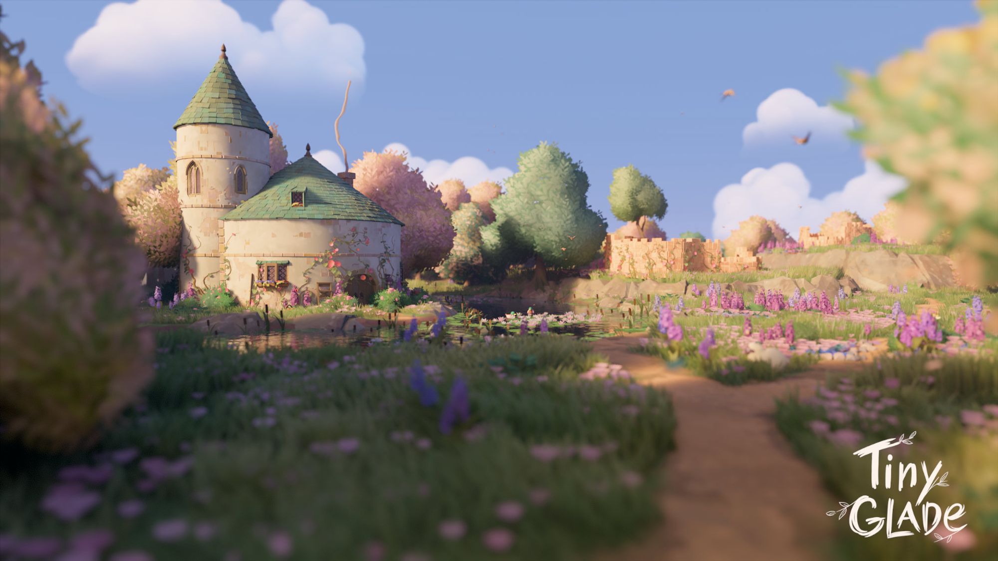 A screenshot of a build from Tiny Glade. A round green-roofed building with a neighbouring tower sits on a small island surrounded by duck and lotus-filled water. A pathway leads to stone ruins overgrown with vines and flowers.