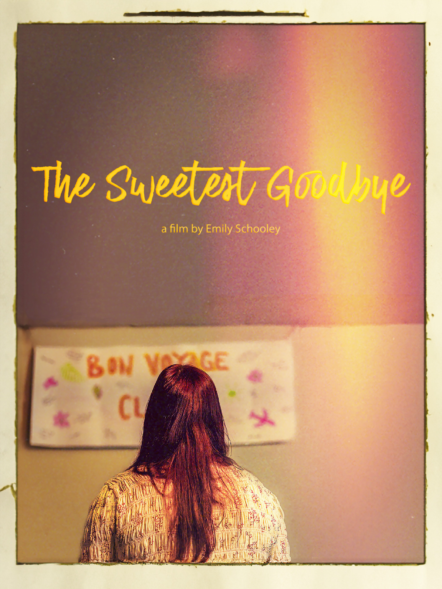 A film poster in shades of yellow. A red-haired woman in a beige top with red flowers has her back turned toward the camera, as she stares at a wall with a "bon voyage" sign. The poster title reads "The Sweetest Goodbye" "a film by Emily Schooley"