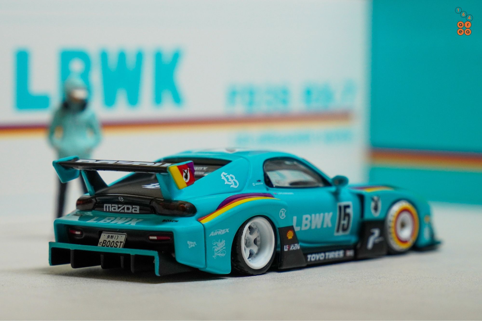 A right side of Mazda RX-7 FD3S, LB-Super Silhouette, Hobby Expo China 2024 Edition by iNNO64 in 1:64 scale with 1:64 figure on AREA 164