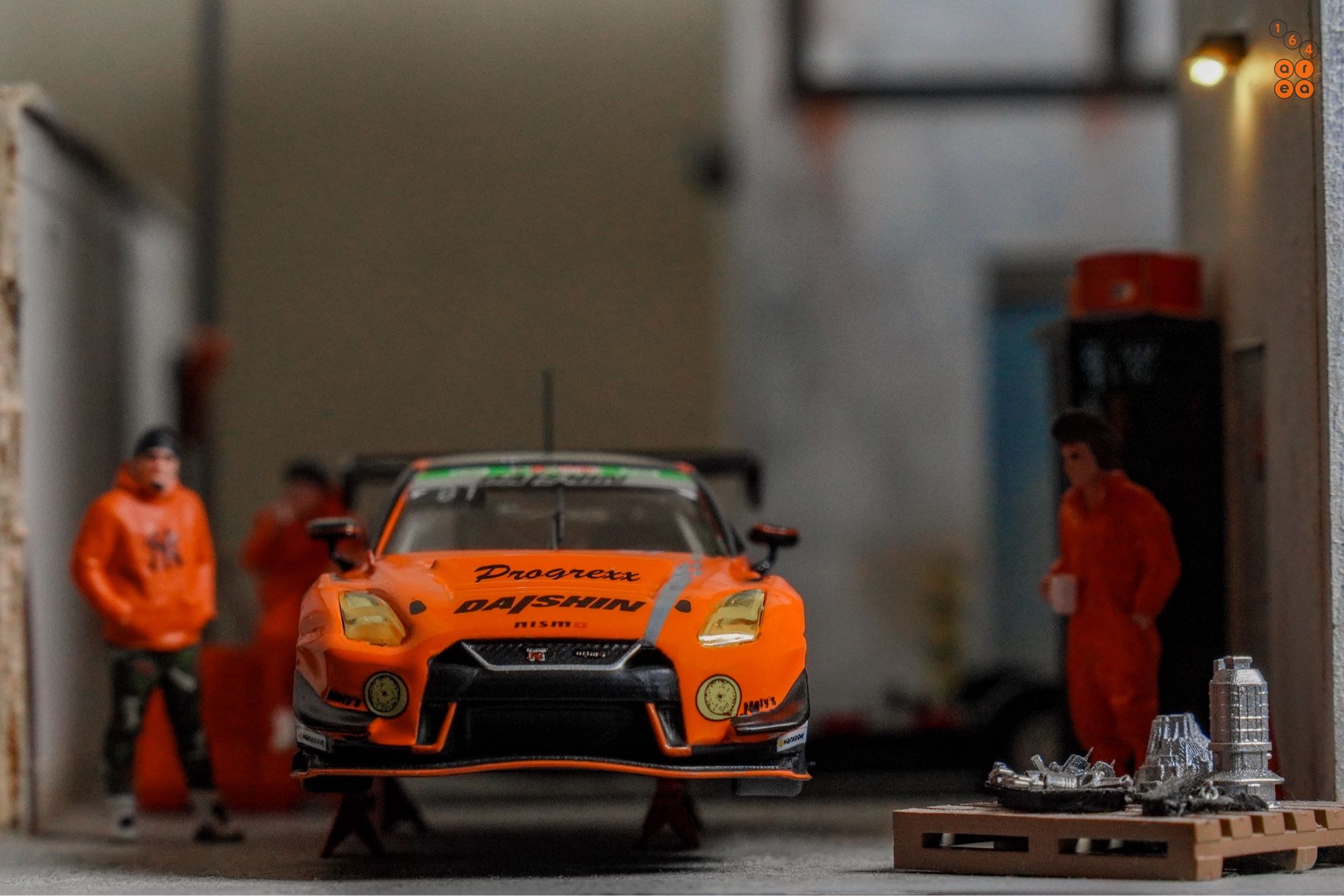 A Nissan GT-R Nismo GT3, Super Taikyu Series 2021, Fuji 24 hours 2021, No. 81 Winner by Tarmac Works in 1:64 scale with 1:64 figure on AREA 164