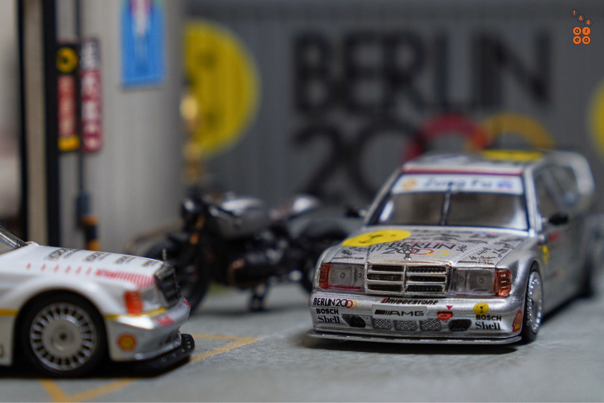 Mercedes-Benz 190E 2.5-16 Evolution II, Berlin 2000 livery by Tarmac Works in 1:64 scale on AREA 164