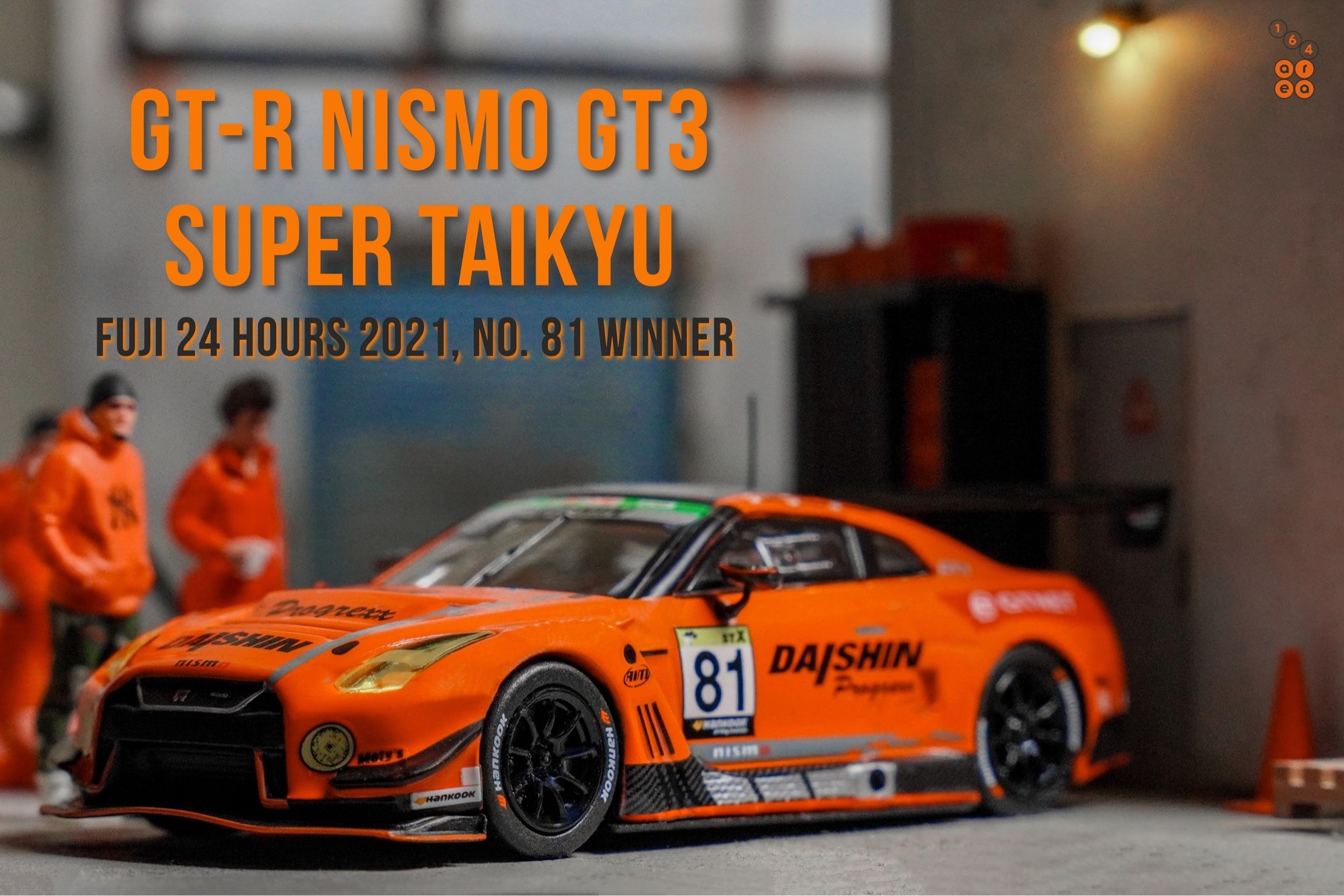 A left side of Nissan GT-R Nismo GT3, Super Taikyu Series 2021, Fuji 24 hours 2021, No. 81 Winner by Tarmac Works in 1:64 scale with 1:64 figure on AREA 164