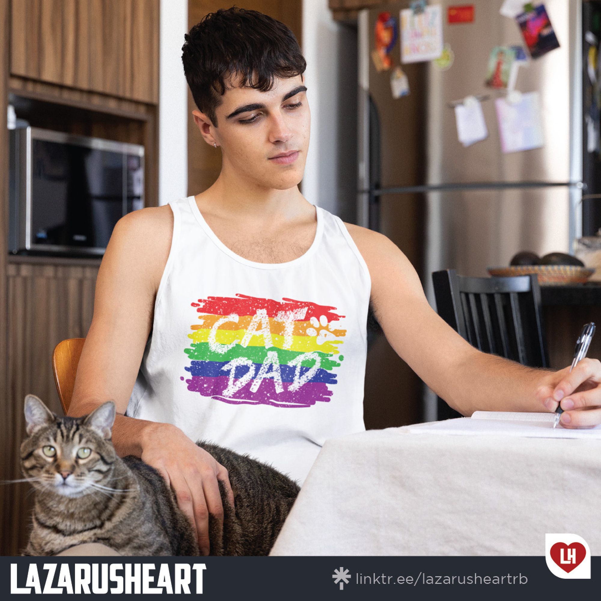 Image features the Lazarusheart logo and a person lovingly stroking a cat. They are wearing a white t-shirt that showcases an illustration of the traditional LGBTQ Rainbow flag, emblazoned with the words "Cat Dad." This design beautifully blends pride and pet parenthood, celebrating LGBTQ cat dads everywhere.