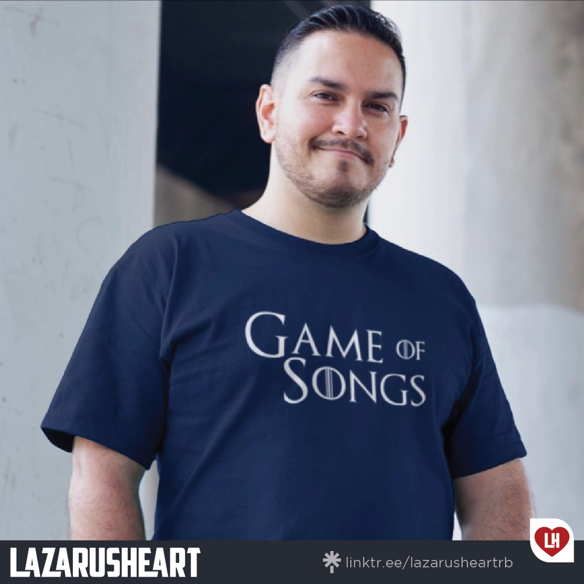 The image showcases the Lazarusheart logo beside a person wearing a t-shirt emblazoned with the slogan "Games of Songs," styled after the iconic "Game of Thrones" logo. This creative design playfully marks the beginning of a new Eurovision year, which kicks off on September 1st, capturing the drama, excitement, and competitive spirit of both epic realms: Westeros and the Eurovision stage.